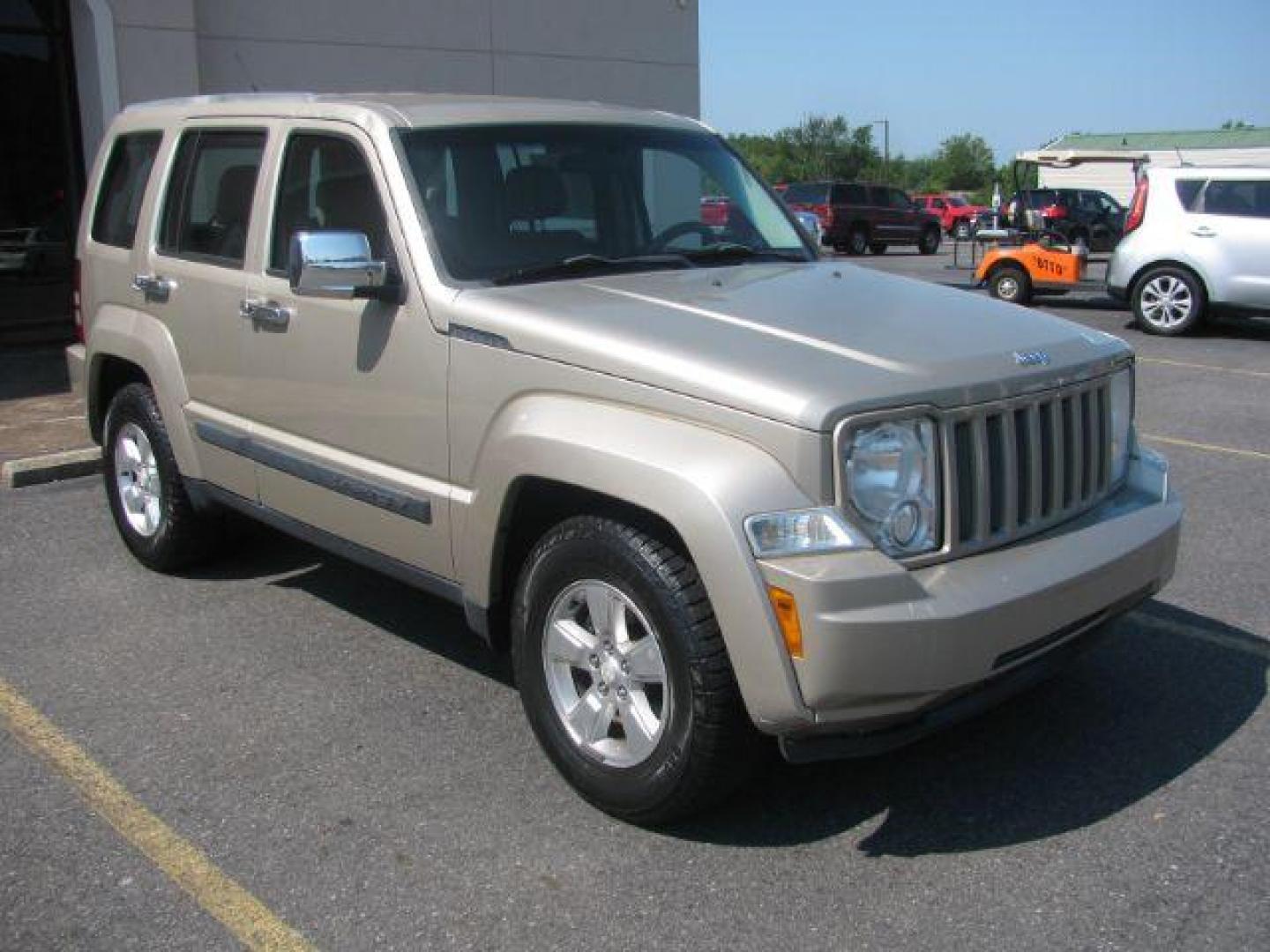 2011 Gold Jeep Liberty Sport 2WD (1J4PP2GK5BW) with an 3.7L V6 SOHC 12V engine, 4-Speed Automatic transmission, located at 2443 Albert Pike, Hot Springs, AR, 71913, (501) 623-6255, 34.492222, -93.109993 - Photo#0