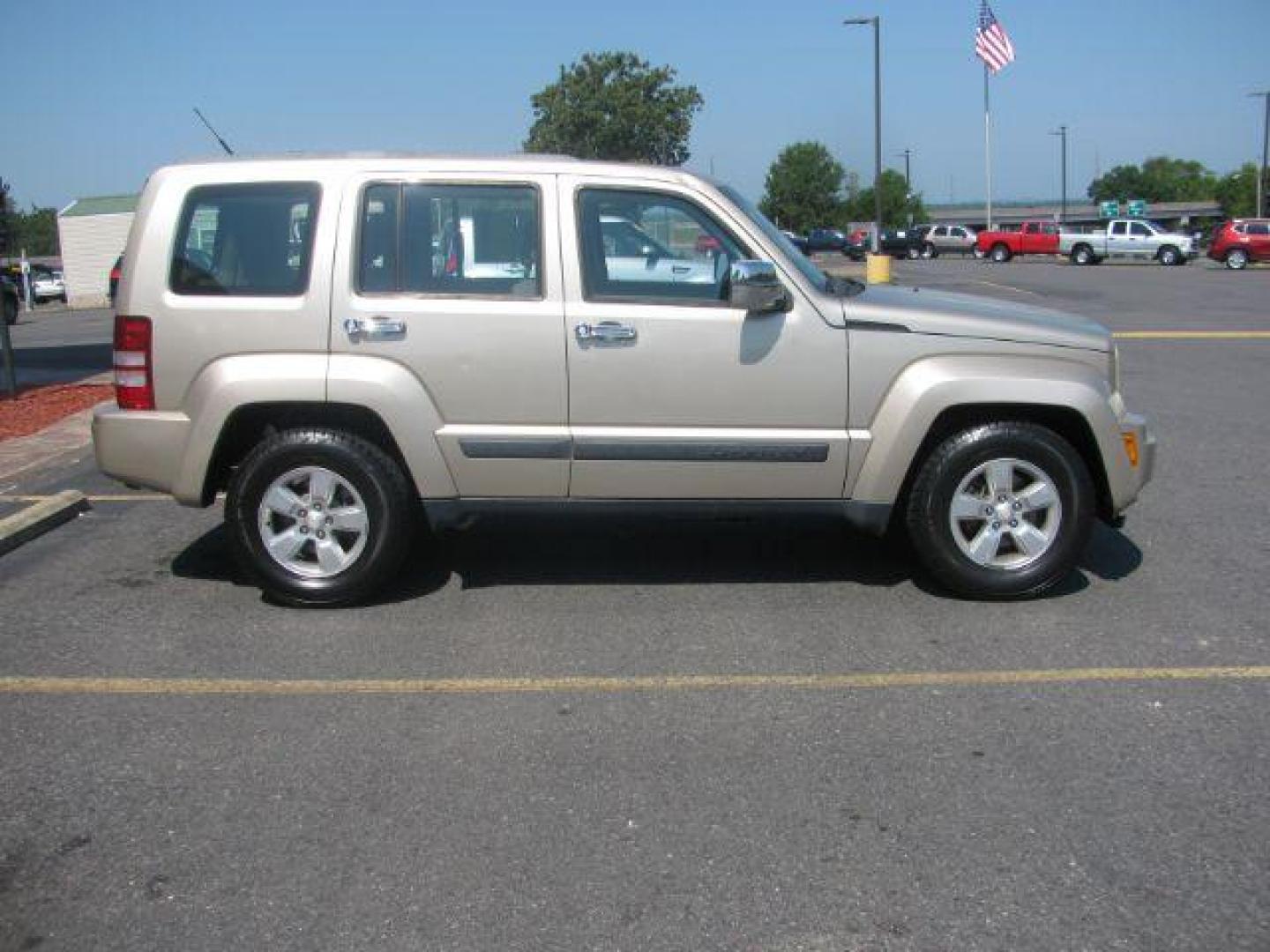 2011 Gold Jeep Liberty Sport 2WD (1J4PP2GK5BW) with an 3.7L V6 SOHC 12V engine, 4-Speed Automatic transmission, located at 2443 Albert Pike, Hot Springs, AR, 71913, (501) 623-6255, 34.492222, -93.109993 - Photo#1