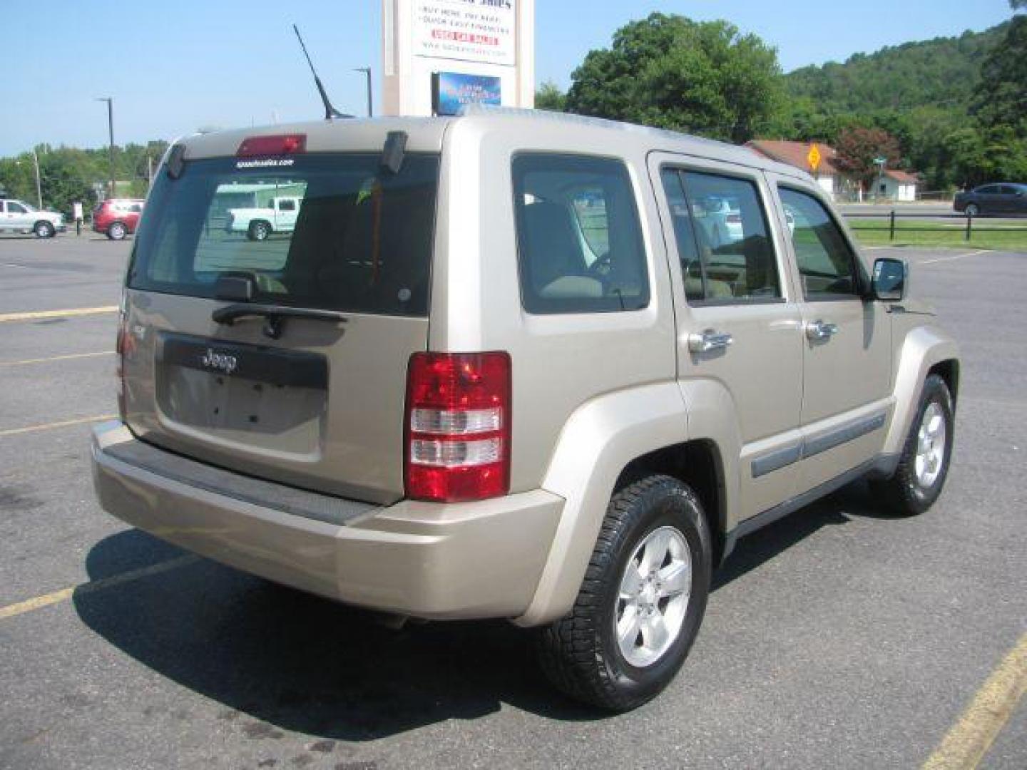 2011 Gold Jeep Liberty Sport 2WD (1J4PP2GK5BW) with an 3.7L V6 SOHC 12V engine, 4-Speed Automatic transmission, located at 2443 Albert Pike, Hot Springs, AR, 71913, (501) 623-6255, 34.492222, -93.109993 - Photo#2