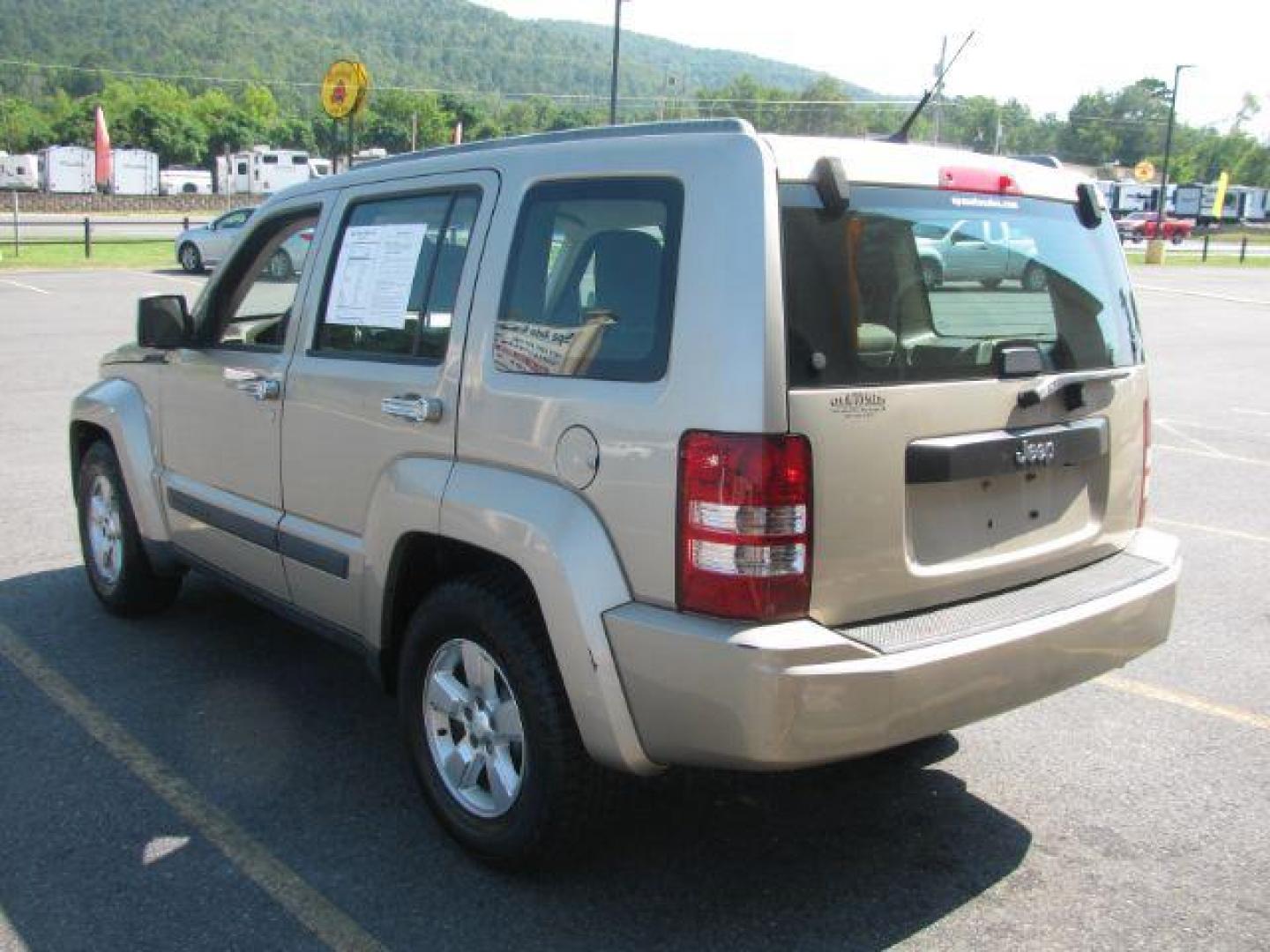 2011 Gold Jeep Liberty Sport 2WD (1J4PP2GK5BW) with an 3.7L V6 SOHC 12V engine, 4-Speed Automatic transmission, located at 2443 Albert Pike, Hot Springs, AR, 71913, (501) 623-6255, 34.492222, -93.109993 - Photo#3