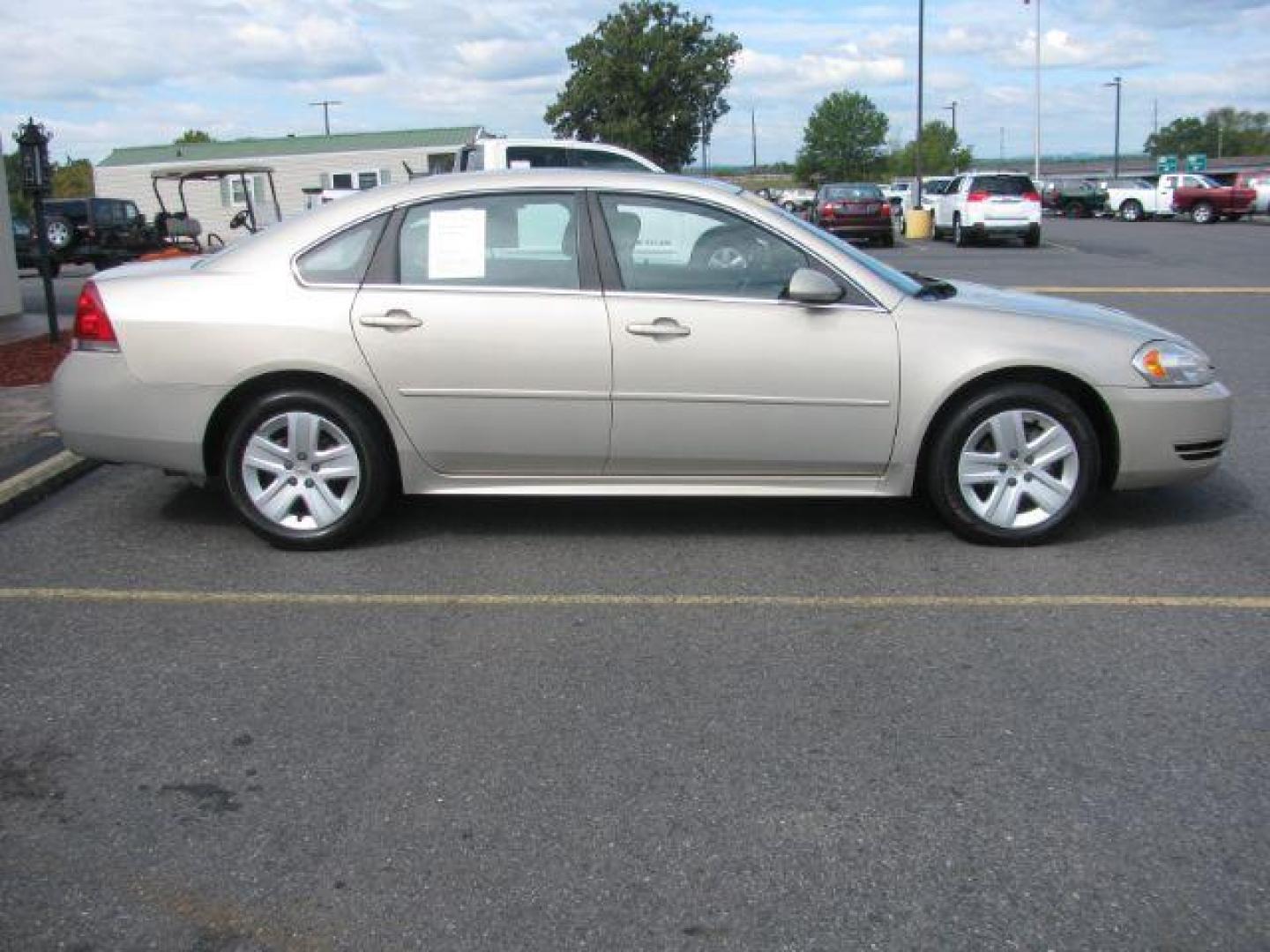 2011 Tan Chevrolet Impala LS (2G1WA5EK9B1) with an 3.5L V6 OHV 16V FFV engine, 4-Speed Automatic transmission, located at 2443 Albert Pike, Hot Springs, AR, 71913, (501) 623-6255, 34.492222, -93.109993 - Photo#1