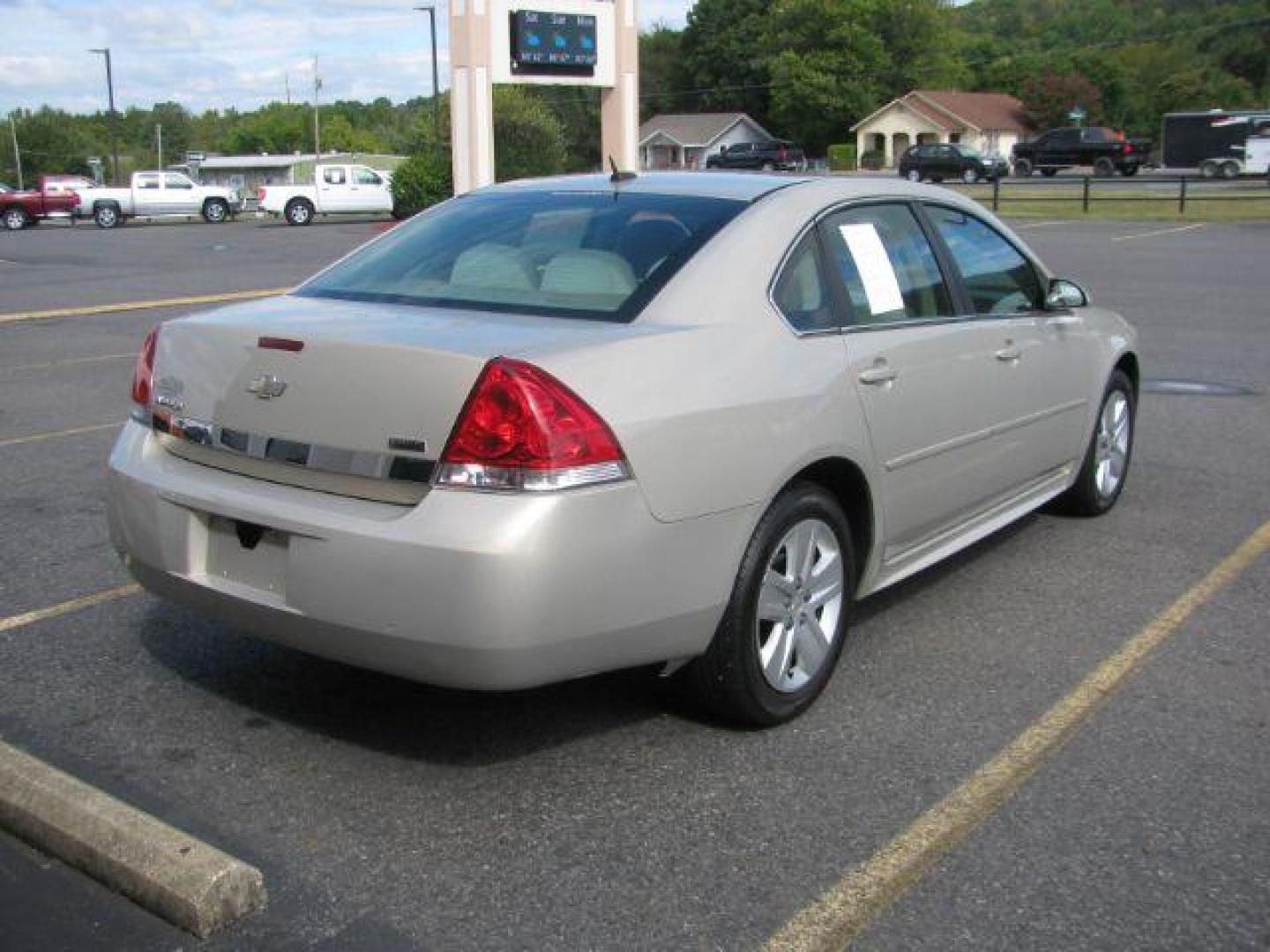 2011 Tan Chevrolet Impala LS (2G1WA5EK9B1) with an 3.5L V6 OHV 16V FFV engine, 4-Speed Automatic transmission, located at 2443 Albert Pike, Hot Springs, AR, 71913, (501) 623-6255, 34.492222, -93.109993 - Photo#2