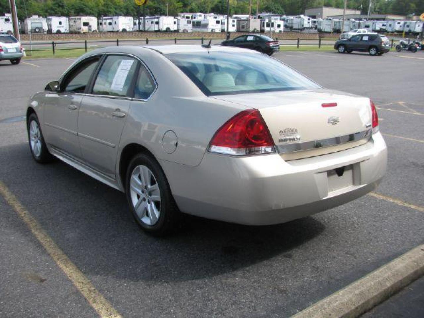 2011 Tan Chevrolet Impala LS (2G1WA5EK9B1) with an 3.5L V6 OHV 16V FFV engine, 4-Speed Automatic transmission, located at 2443 Albert Pike, Hot Springs, AR, 71913, (501) 623-6255, 34.492222, -93.109993 - Photo#3