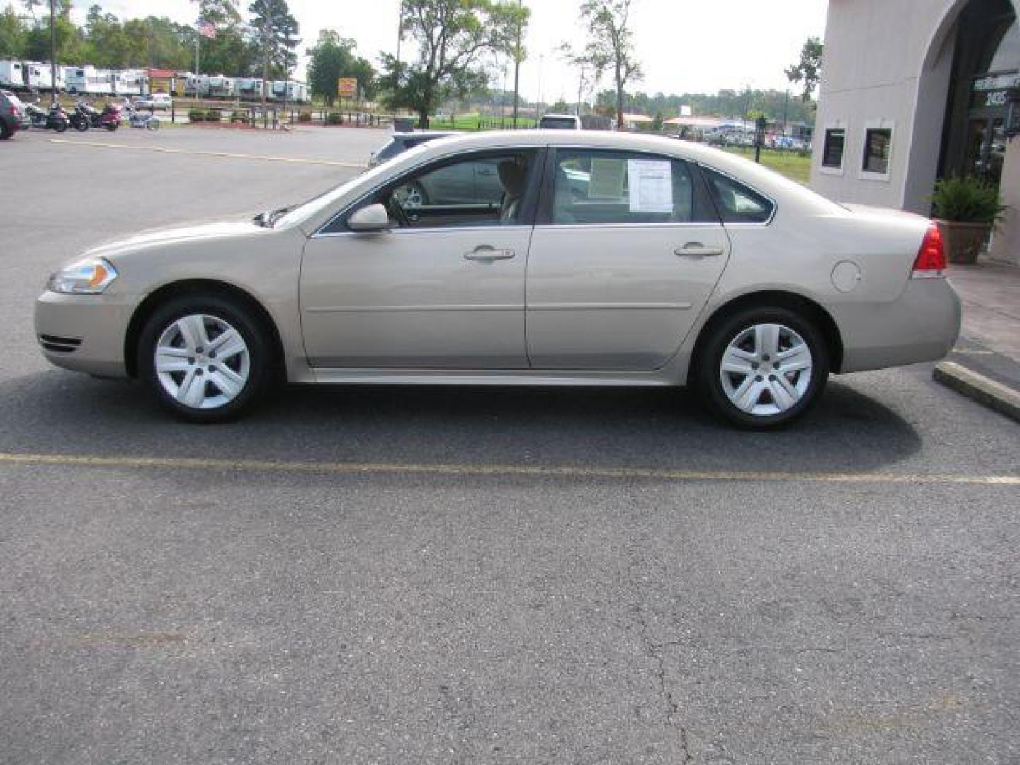 2011 Tan Chevrolet Impala LS (2G1WA5EK9B1) with an 3.5L V6 OHV 16V FFV engine, 4-Speed Automatic transmission, located at 2443 Albert Pike, Hot Springs, AR, 71913, (501) 623-6255, 34.492222, -93.109993 - Photo#4