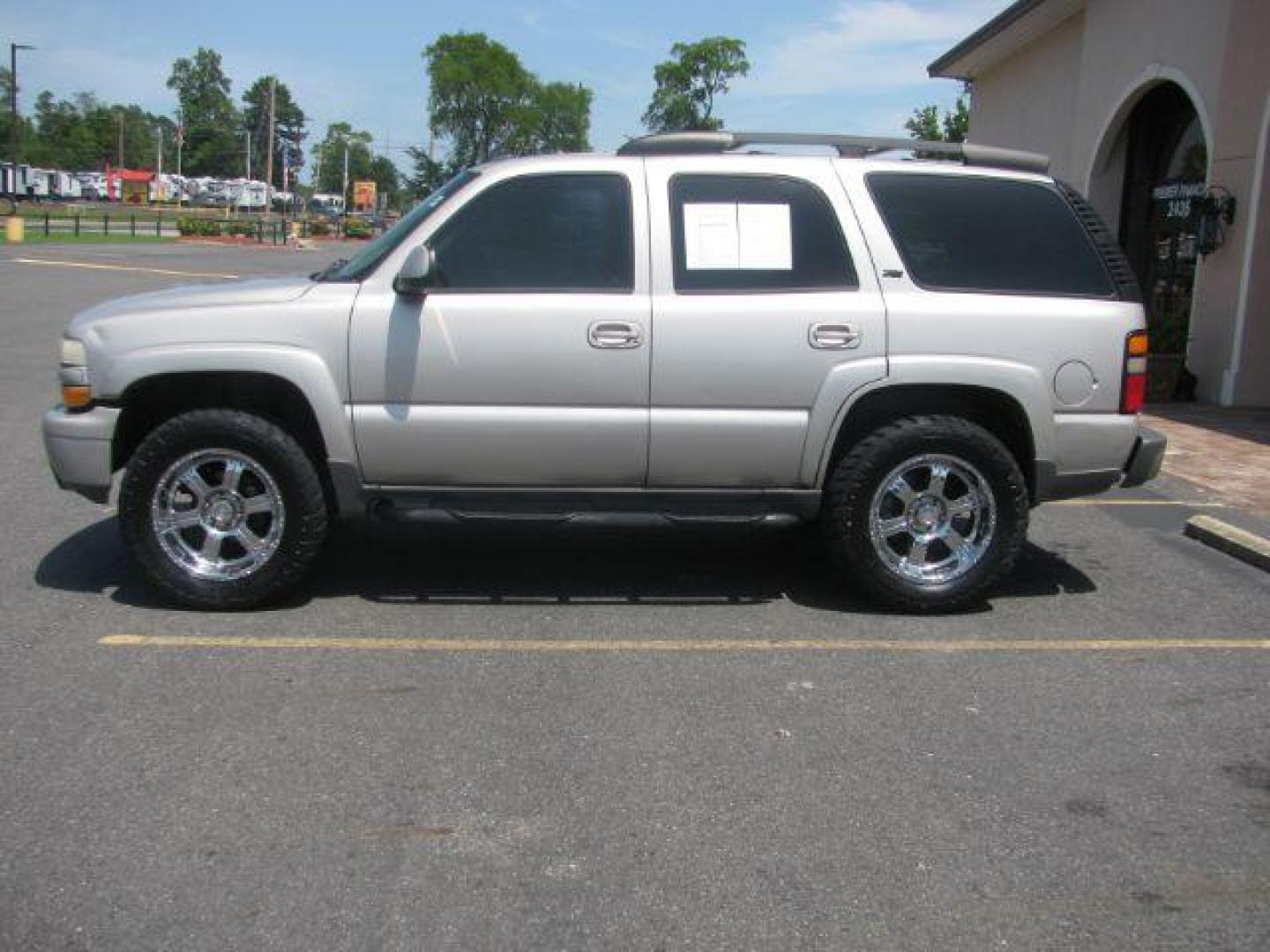 2006 Silver Chevrolet Tahoe 4WD (1GNEK13Z76R) with an 5.3L V8 OHV 16V FFV engine, 4-Speed Automatic transmission, located at 2443 Albert Pike, Hot Springs, AR, 71913, (501) 623-6255, 34.492222, -93.109993 - LISTED FEATURES MAY BE OPTIONAL AND NOT INCLUDED ON THIS VEHICLE!!! - Photo#1