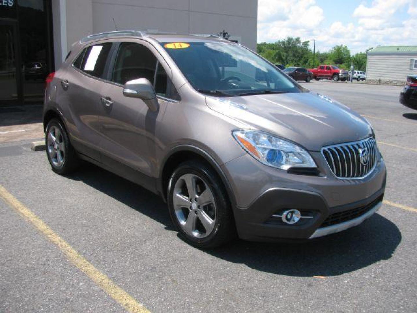 2014 Brown Buick Encore Leather FWD (KL4CJCSB7EB) with an 1.4L L4 DOHC 16V TURBO engine, 6-Speed Automatic transmission, located at 2443 Albert Pike, Hot Springs, AR, 71913, (501) 623-6255, 34.492222, -93.109993 - Photo#0