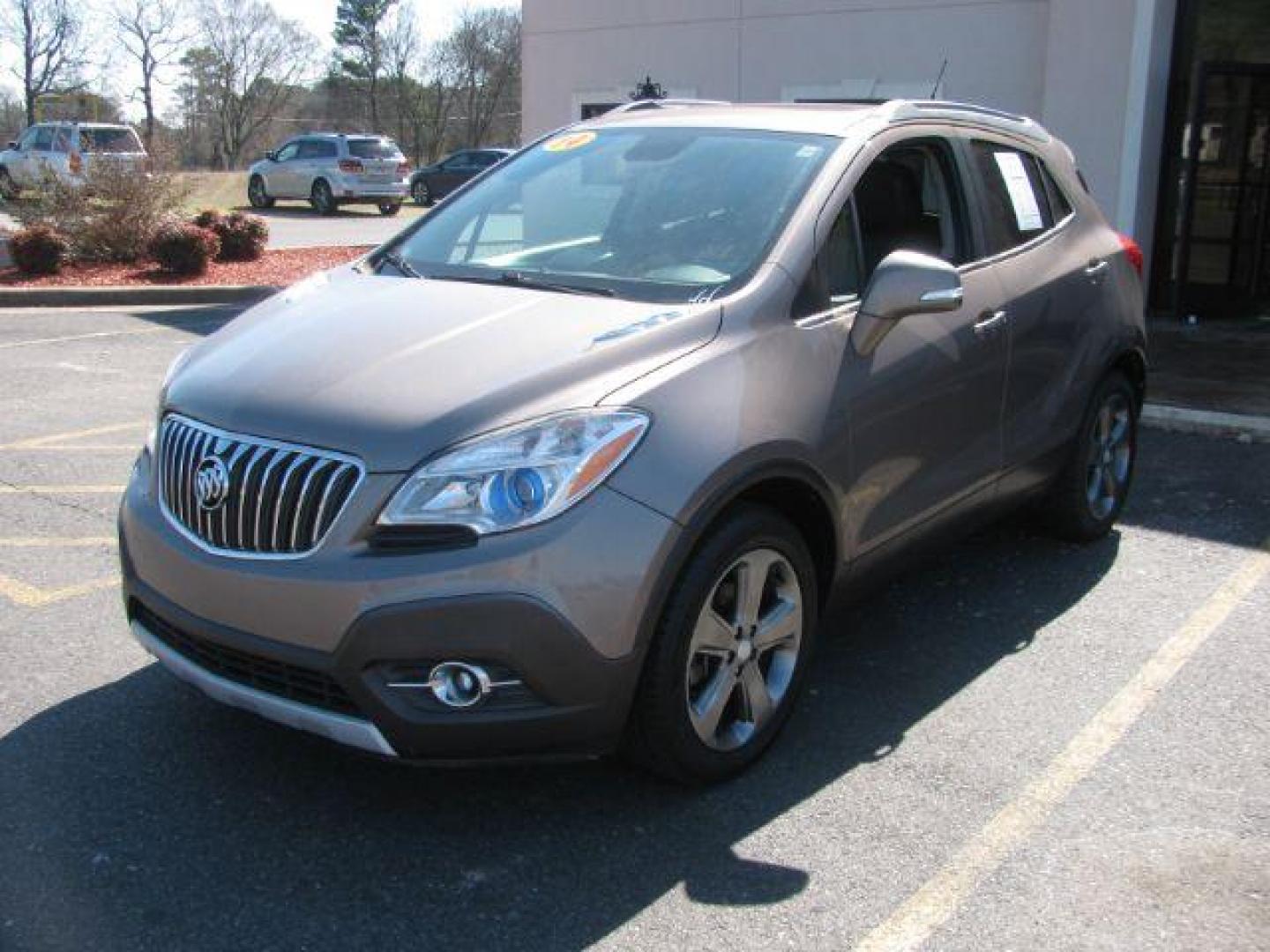 2014 Brown Buick Encore Leather FWD (KL4CJCSB7EB) with an 1.4L L4 DOHC 16V TURBO engine, 6-Speed Automatic transmission, located at 2443 Albert Pike, Hot Springs, AR, 71913, (501) 623-6255, 34.492222, -93.109993 - Photo#0