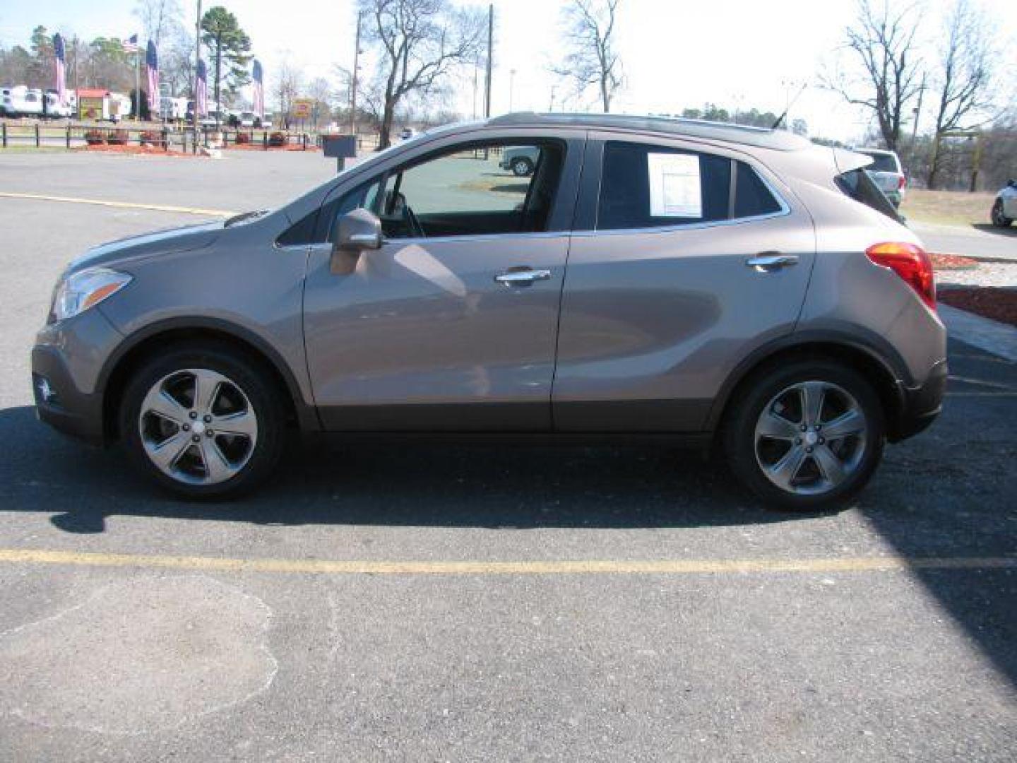 2014 Brown Buick Encore Leather FWD (KL4CJCSB7EB) with an 1.4L L4 DOHC 16V TURBO engine, 6-Speed Automatic transmission, located at 2443 Albert Pike, Hot Springs, AR, 71913, (501) 623-6255, 34.492222, -93.109993 - Photo#1