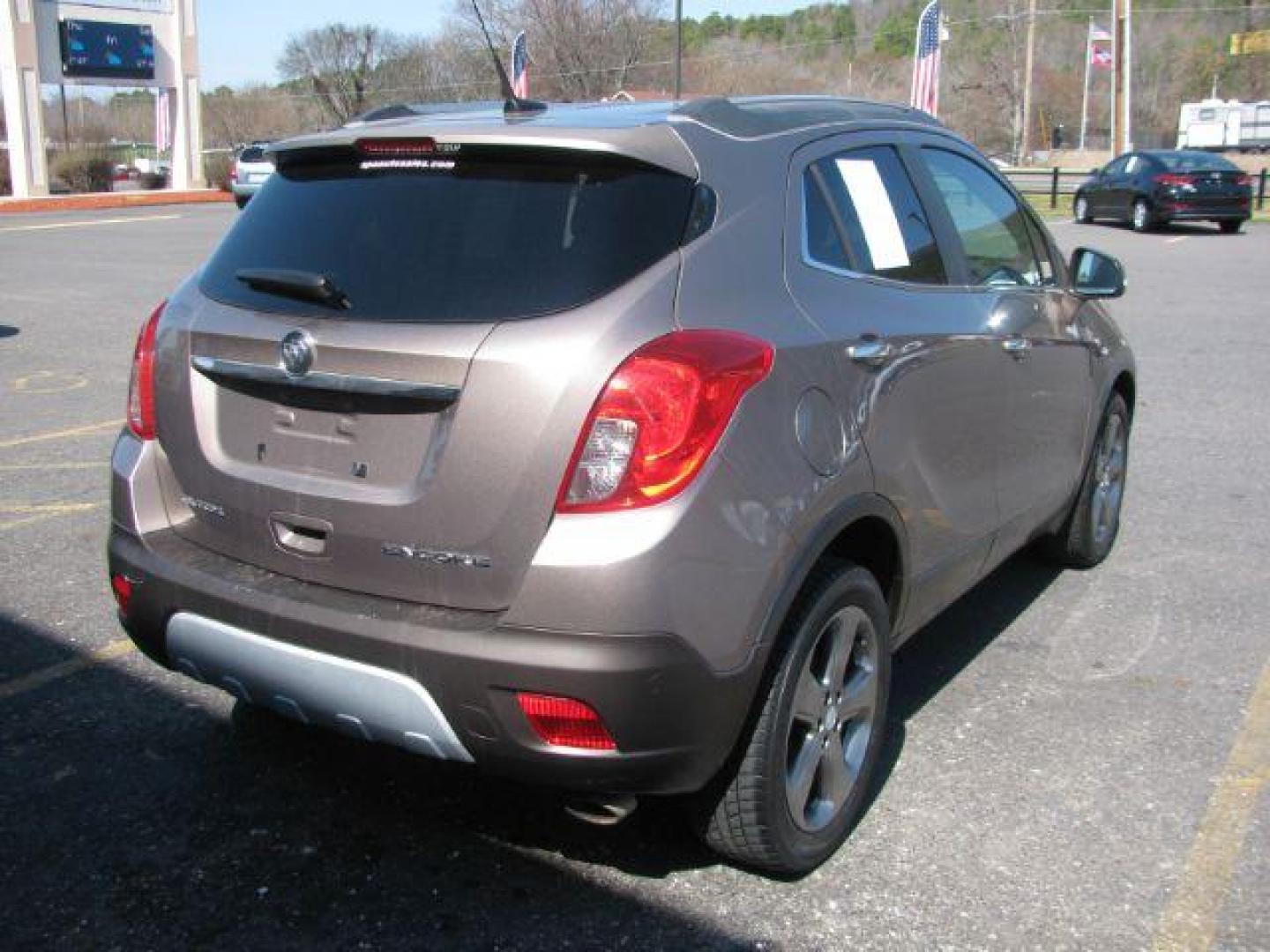 2014 Brown Buick Encore Leather FWD (KL4CJCSB7EB) with an 1.4L L4 DOHC 16V TURBO engine, 6-Speed Automatic transmission, located at 2443 Albert Pike, Hot Springs, AR, 71913, (501) 623-6255, 34.492222, -93.109993 - Photo#3