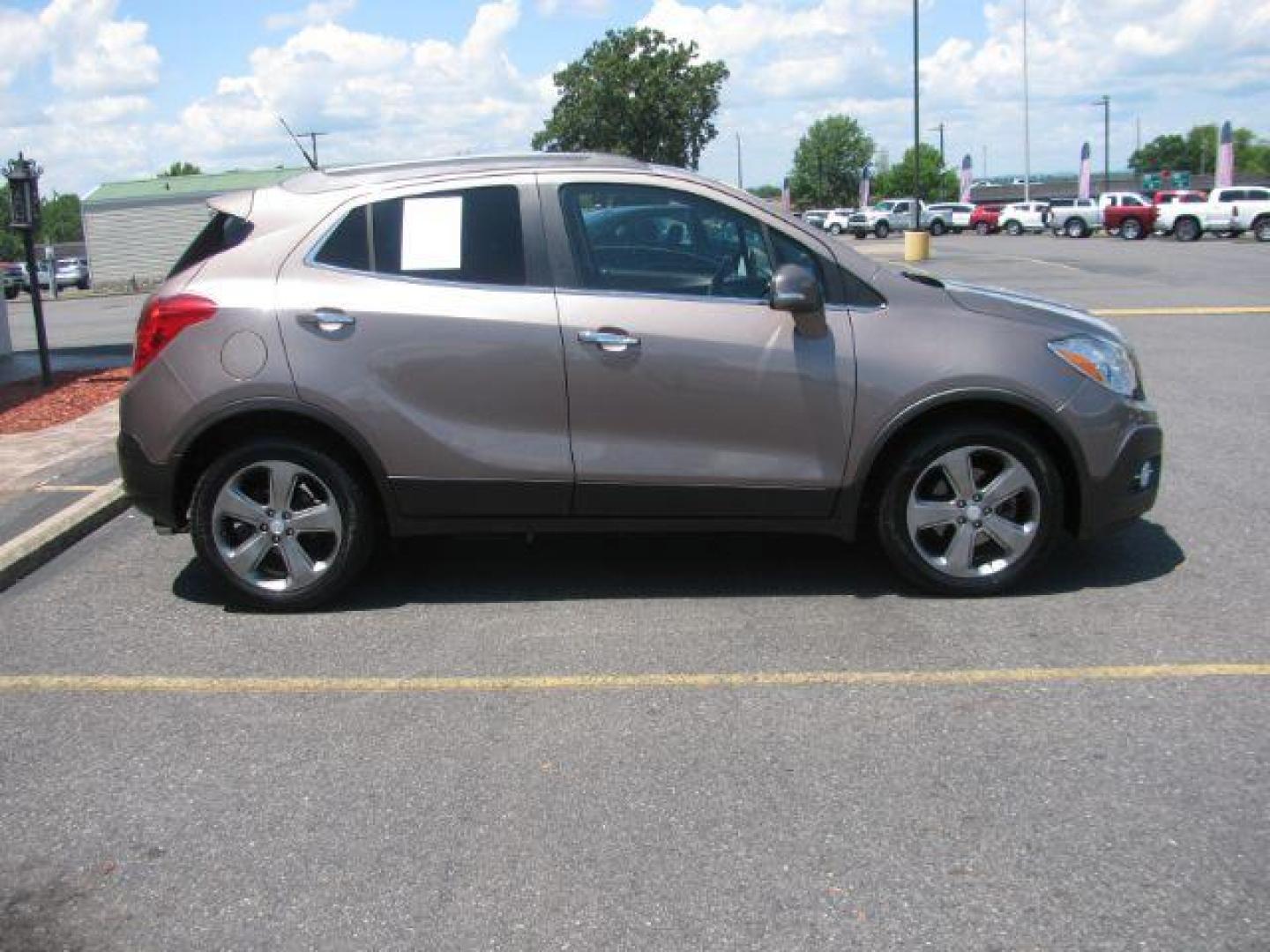 2014 Brown Buick Encore Leather FWD (KL4CJCSB7EB) with an 1.4L L4 DOHC 16V TURBO engine, 6-Speed Automatic transmission, located at 2443 Albert Pike, Hot Springs, AR, 71913, (501) 623-6255, 34.492222, -93.109993 - Photo#1