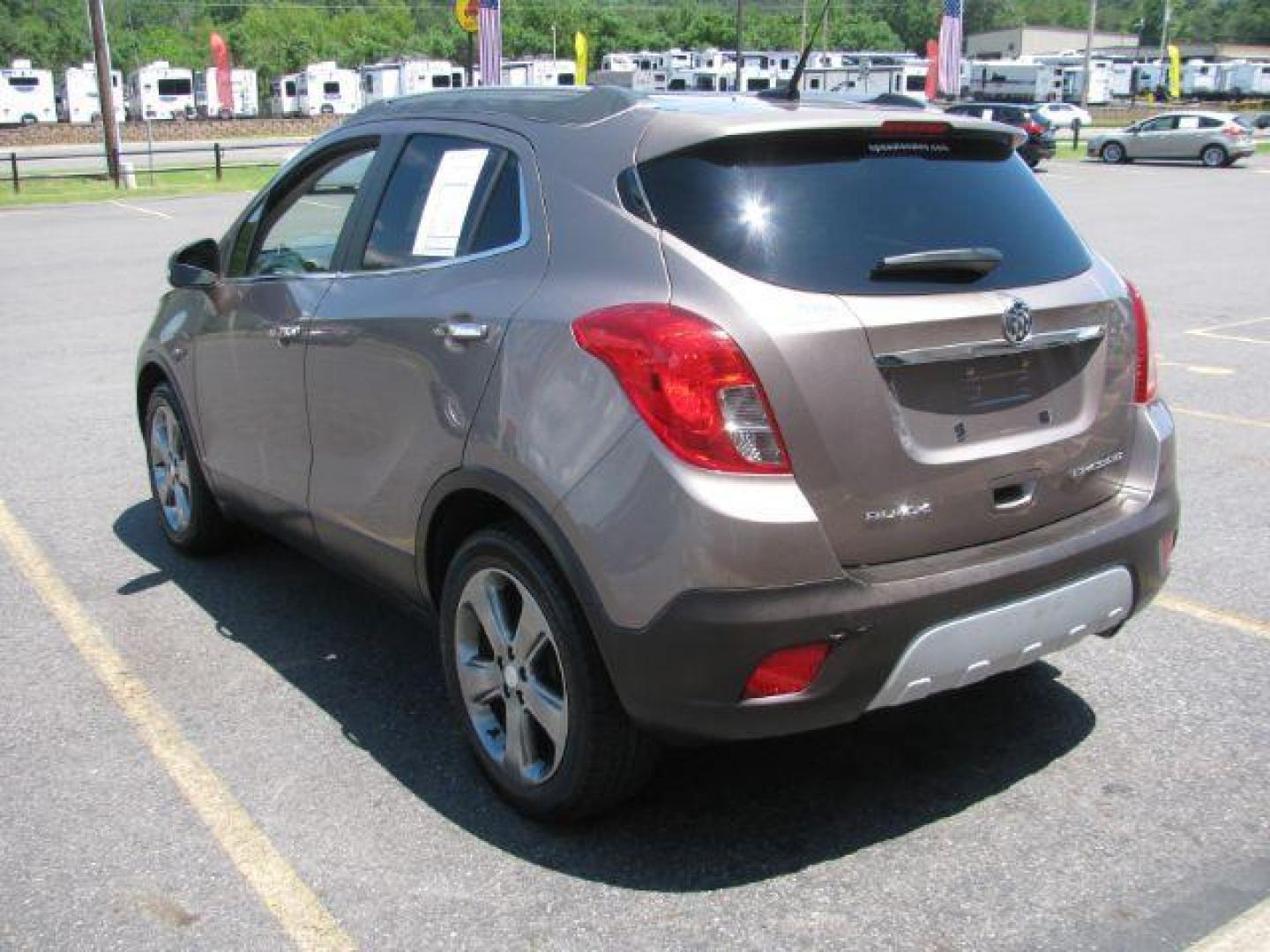 2014 Brown Buick Encore Leather FWD (KL4CJCSB7EB) with an 1.4L L4 DOHC 16V TURBO engine, 6-Speed Automatic transmission, located at 2443 Albert Pike, Hot Springs, AR, 71913, (501) 623-6255, 34.492222, -93.109993 - Photo#3