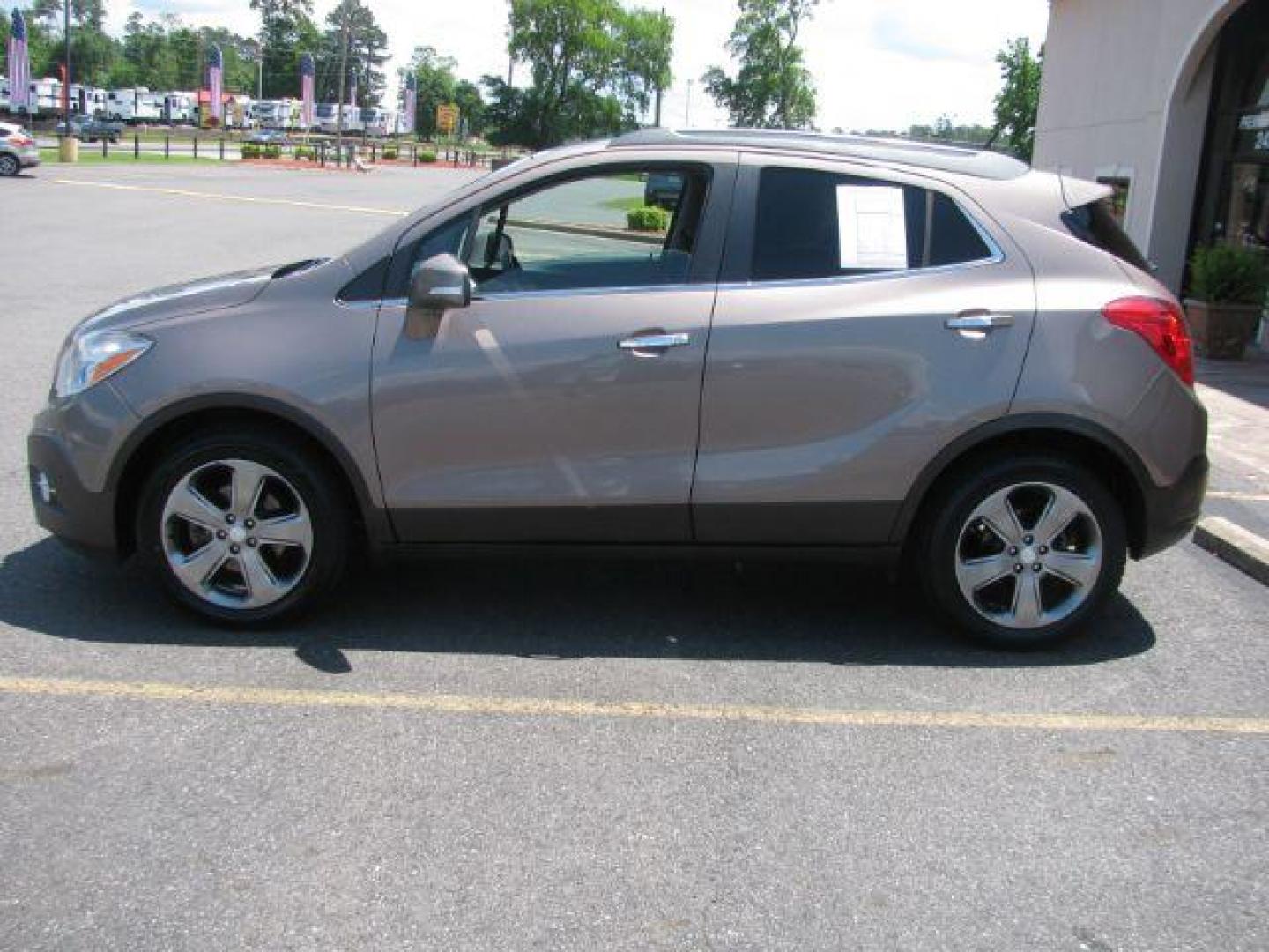 2014 Brown Buick Encore Leather FWD (KL4CJCSB7EB) with an 1.4L L4 DOHC 16V TURBO engine, 6-Speed Automatic transmission, located at 2443 Albert Pike, Hot Springs, AR, 71913, (501) 623-6255, 34.492222, -93.109993 - Photo#4