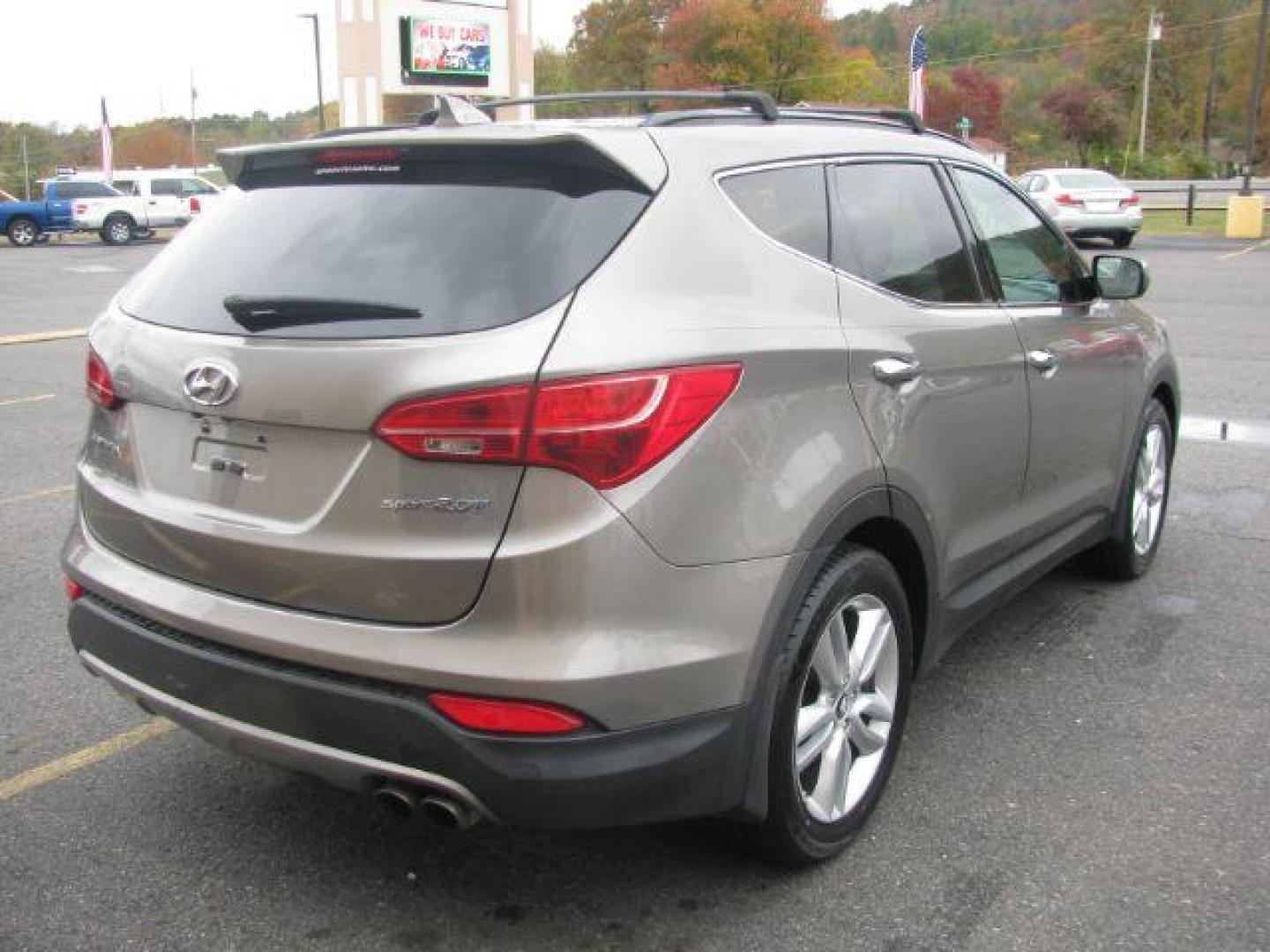 2013 Brown Hyundai Santa Fe Sport 2.0 FWD (5XYZU3LA4DG) with an 2.0L L4 DOHC 16V engine, 6-Speed Automatic transmission, located at 2443 Albert Pike, Hot Springs, AR, 71913, (501) 623-6255, 34.492222, -93.109993 - Photo#3