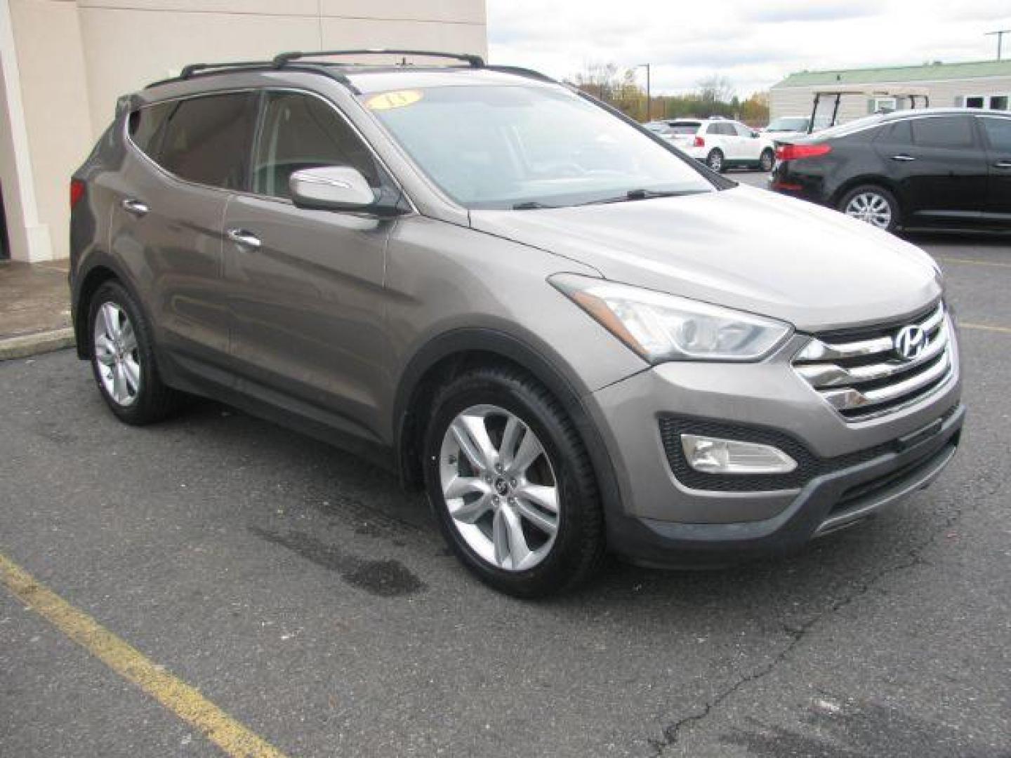 2013 Brown Hyundai Santa Fe Sport 2.0 FWD (5XYZU3LA4DG) with an 2.0L L4 DOHC 16V engine, 6-Speed Automatic transmission, located at 2443 Albert Pike, Hot Springs, AR, 71913, (501) 623-6255, 34.492222, -93.109993 - Photo#5