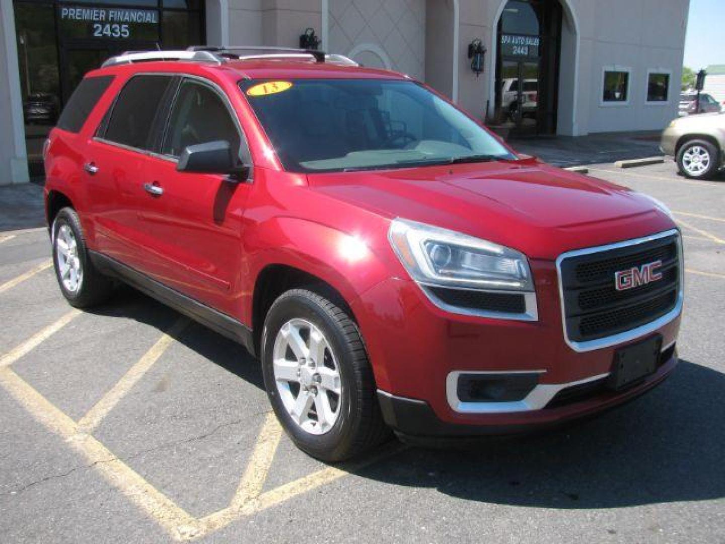 2013 Maroon GMC Acadia SLE-1 FWD (1GKKRNED1DJ) with an 3.6L V6 DOHC 24V engine, 6-Speed Automatic transmission, located at 2443 Albert Pike, Hot Springs, AR, 71913, (501) 623-6255, 34.492222, -93.109993 - Photo#0