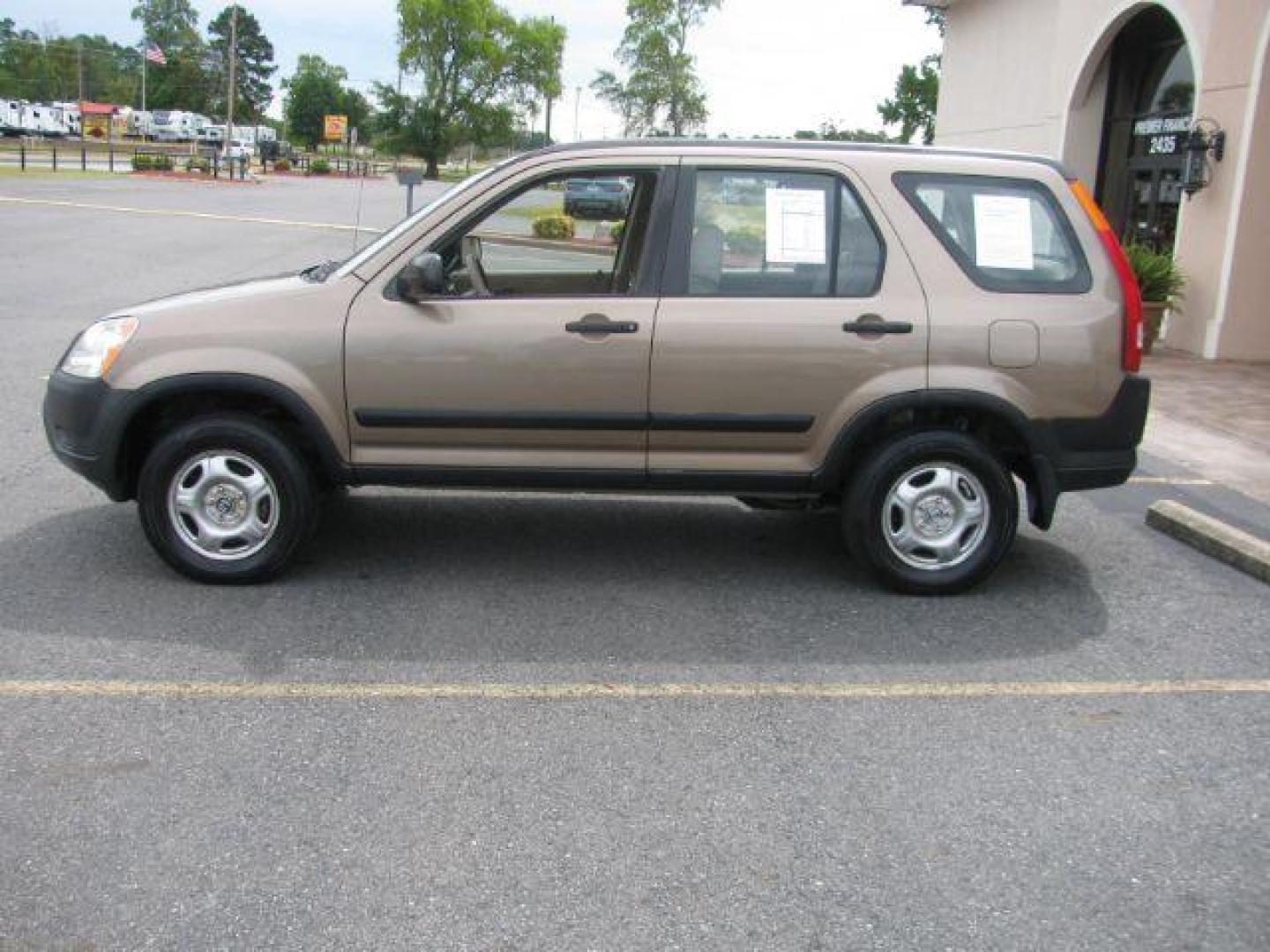 2004 Brown Honda CR-V LX 2WD AT (JHLRD68434C) with an 2.4L L4 DOHC 16V engine, 4-Speed Automatic transmission, located at 2443 Albert Pike, Hot Springs, AR, 71913, (501) 623-6255, 34.492222, -93.109993 - Photo#1