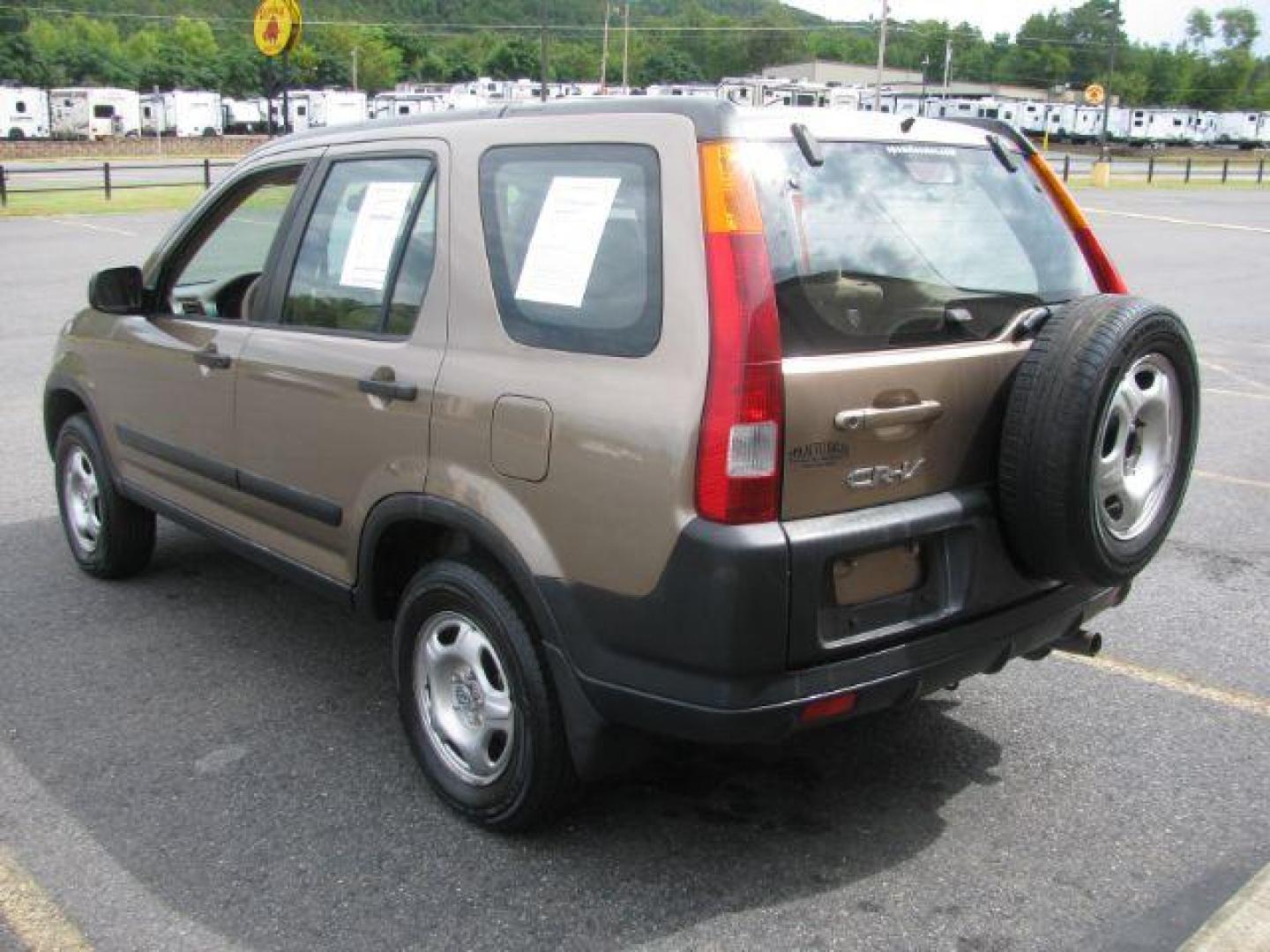 2004 Brown Honda CR-V LX 2WD AT (JHLRD68434C) with an 2.4L L4 DOHC 16V engine, 4-Speed Automatic transmission, located at 2443 Albert Pike, Hot Springs, AR, 71913, (501) 623-6255, 34.492222, -93.109993 - Photo#2