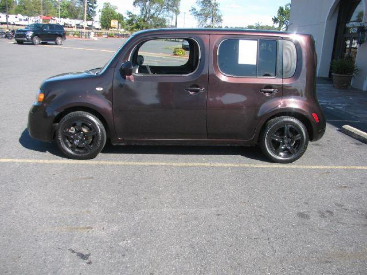 2010 Maroon Nissan cube 1.8 Base (JN8AZ2KR4AT) with an 1.8L L4 DOHC 16V engine, 6-Speed Manual transmission, located at 2443 Albert Pike, Hot Springs, AR, 71913, (501) 623-6255, 34.492222, -93.109993 - Photo#1