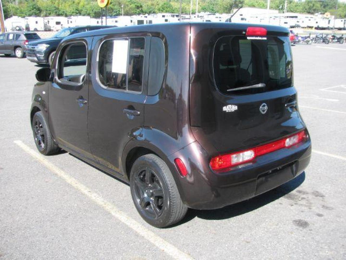 2010 Maroon Nissan cube 1.8 Base (JN8AZ2KR4AT) with an 1.8L L4 DOHC 16V engine, 6-Speed Manual transmission, located at 2443 Albert Pike, Hot Springs, AR, 71913, (501) 623-6255, 34.492222, -93.109993 - Photo#2