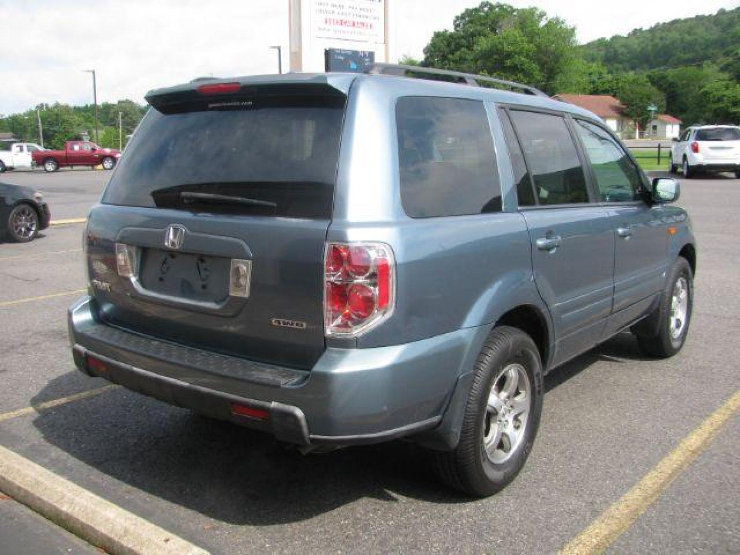 2006 Blue Honda Pilot EX 4WD w/ Leather and DVD (5FNYF18636B) with an 3.5L V6 SOHC 24V engine, 5-Speed Automatic transmission, located at 2443 Albert Pike, Hot Springs, AR, 71913, (501) 623-6255, 34.492222, -93.109993 - Photo#2