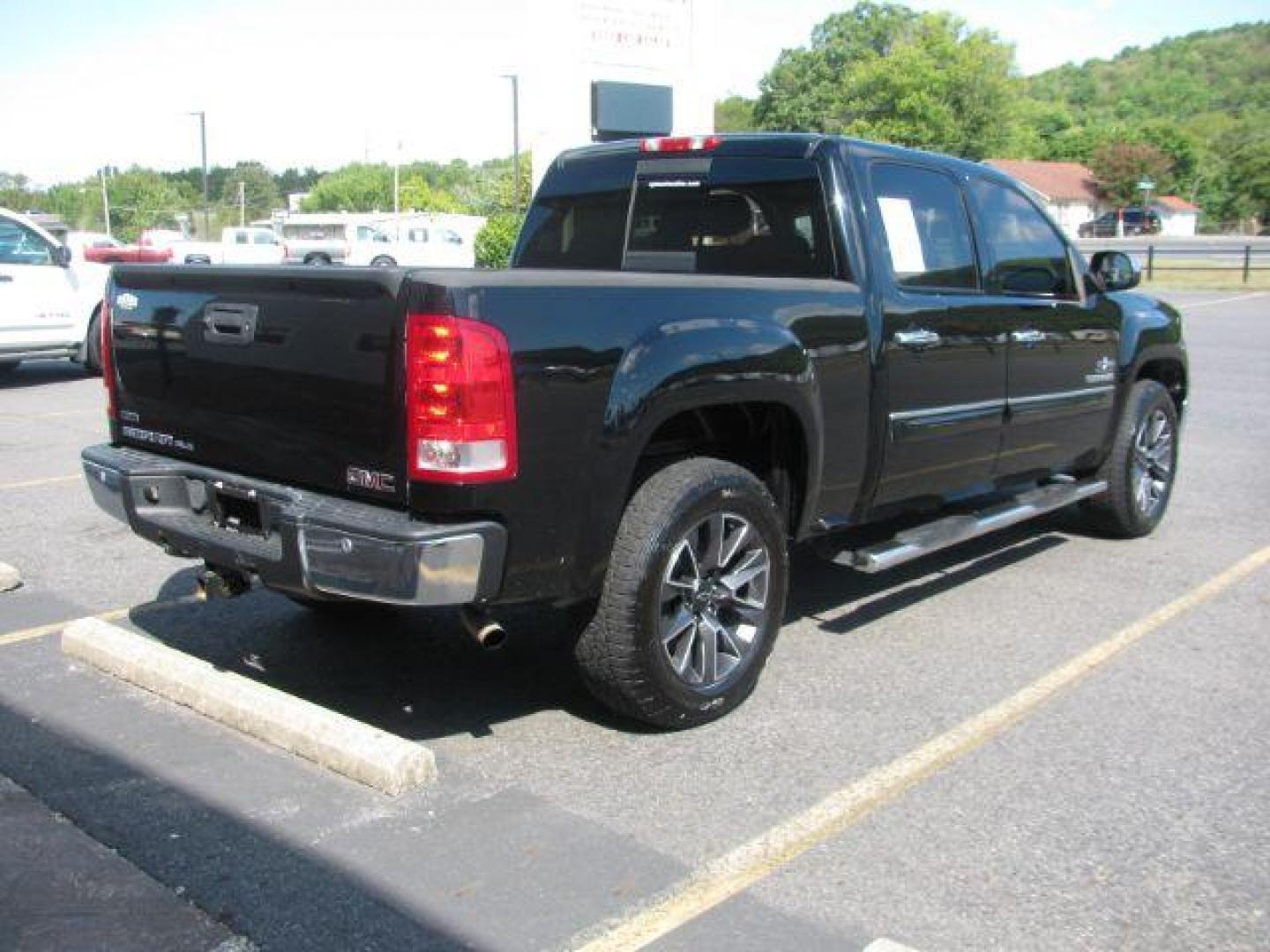 2011 Black GMC Sierra 1500 SLE Crew Cab 2WD (3GTP1VE07BG) with an 5.3L V8 OHV 16V FFV engine, 6-Speed Automatic transmission, located at 2443 Albert Pike, Hot Springs, AR, 71913, (501) 623-6255, 34.492222, -93.109993 - LISTED FEATURES MAY BE OPTIONAL AND NOT INCLUDED ON THIS VEHICLE!!! - Photo#2