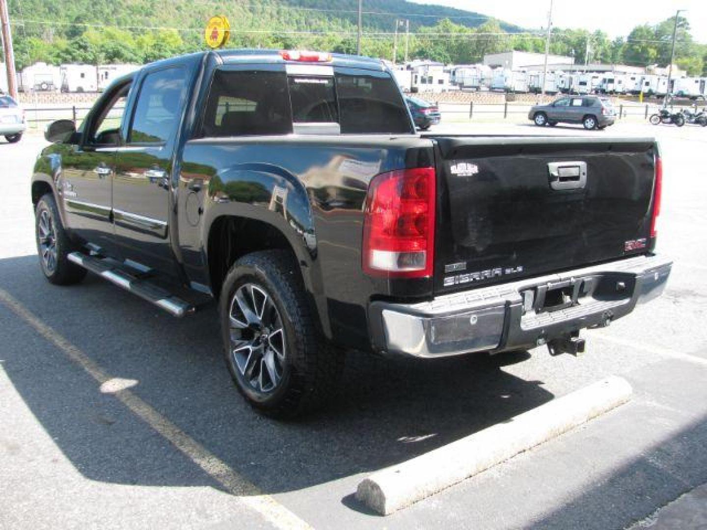 2011 Black GMC Sierra 1500 SLE Crew Cab 2WD (3GTP1VE07BG) with an 5.3L V8 OHV 16V FFV engine, 6-Speed Automatic transmission, located at 2443 Albert Pike, Hot Springs, AR, 71913, (501) 623-6255, 34.492222, -93.109993 - LISTED FEATURES MAY BE OPTIONAL AND NOT INCLUDED ON THIS VEHICLE!!! - Photo#4