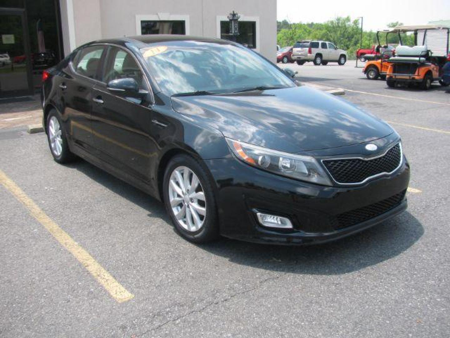 2014 Black Kia Optima EX (5XXGN4A73EG) with an 2.4L L4 DOHC 16V engine, 6-Speed Automatic transmission, located at 2443 Albert Pike, Hot Springs, AR, 71913, (501) 623-6255, 34.492222, -93.109993 - Photo#0