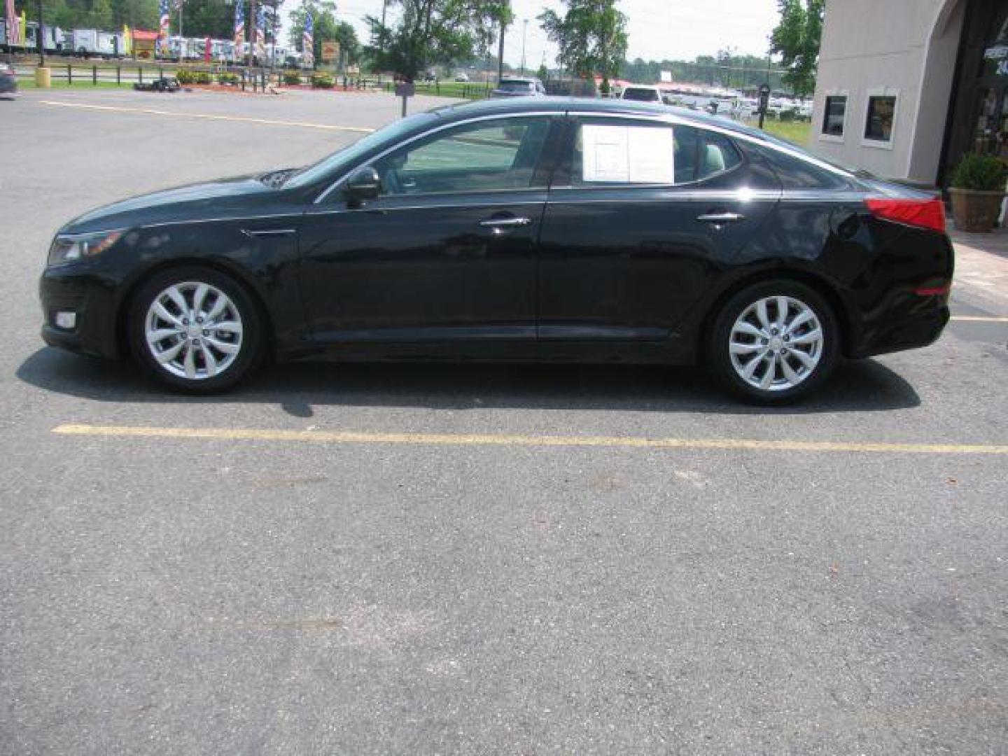 2014 Black Kia Optima EX (5XXGN4A73EG) with an 2.4L L4 DOHC 16V engine, 6-Speed Automatic transmission, located at 2443 Albert Pike, Hot Springs, AR, 71913, (501) 623-6255, 34.492222, -93.109993 - Photo#4