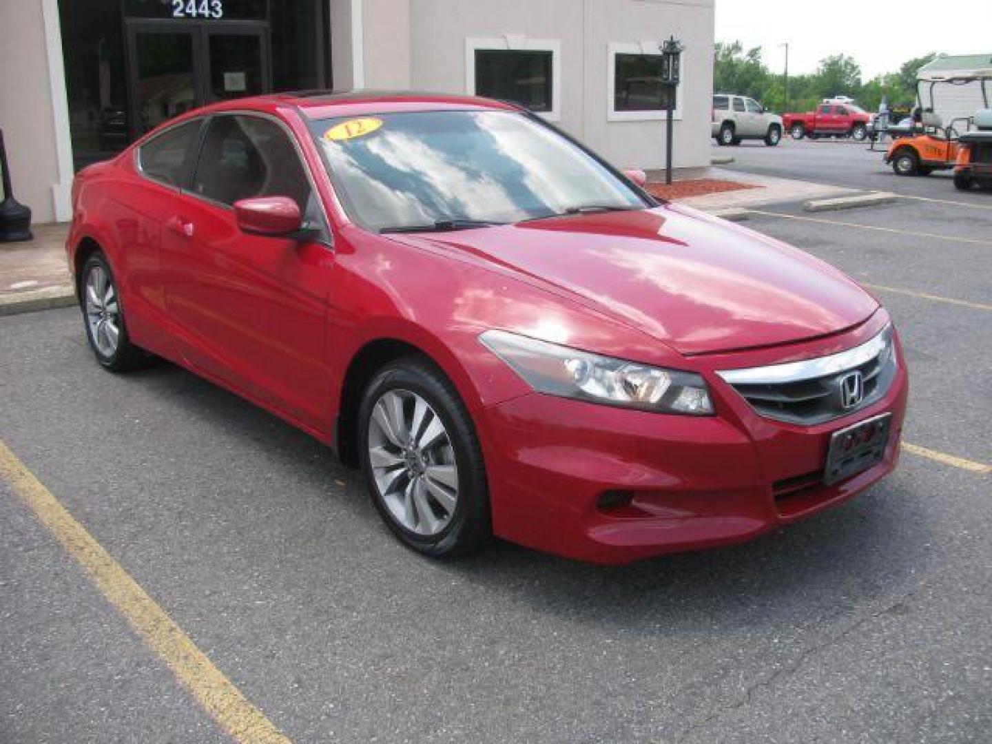 2012 Red Honda Accord EX-L Coupe AT (1HGCS1B85CA) with an 2.4L L4 DOHC 16V engine, 6-Speed Automatic transmission, located at 2443 Albert Pike, Hot Springs, AR, 71913, (501) 623-6255, 34.492222, -93.109993 - Photo#0