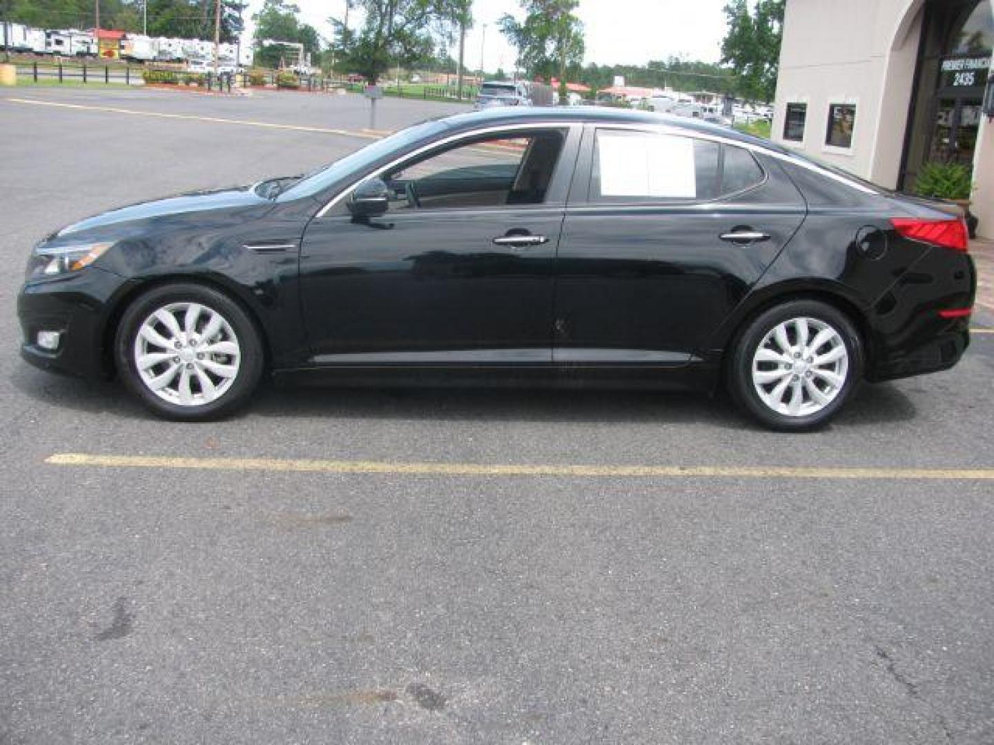 2015 Black Kia Optima EX (5XXGN4A74FG) with an 2.4L L4 DOHC 16V engine, 6-Speed Automatic transmission, located at 2443 Albert Pike, Hot Springs, AR, 71913, (501) 623-6255, 34.492222, -93.109993 - LISTED FEATURES MAY BE OPTIONAL AND NOT INCLUDED ON THIS VEHICLE!!! - Photo#1