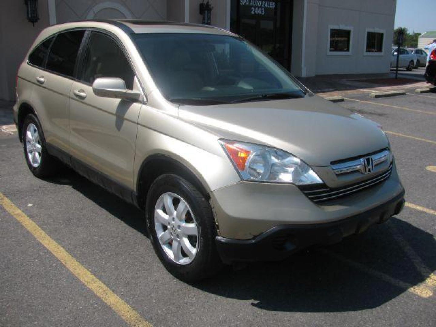 2009 Gold Honda CR-V EX-L 4WD 5-Speed AT (5J6RE48729L) with an 2.4L L4 DOHC 16V engine, 5-Speed Automatic transmission, located at 2443 Albert Pike, Hot Springs, AR, 71913, (501) 623-6255, 34.492222, -93.109993 - LISTED FEATURES MAY BE OPTIONAL AND NOT INCLUDED ON THIS VEHICLE!!! - Photo#0