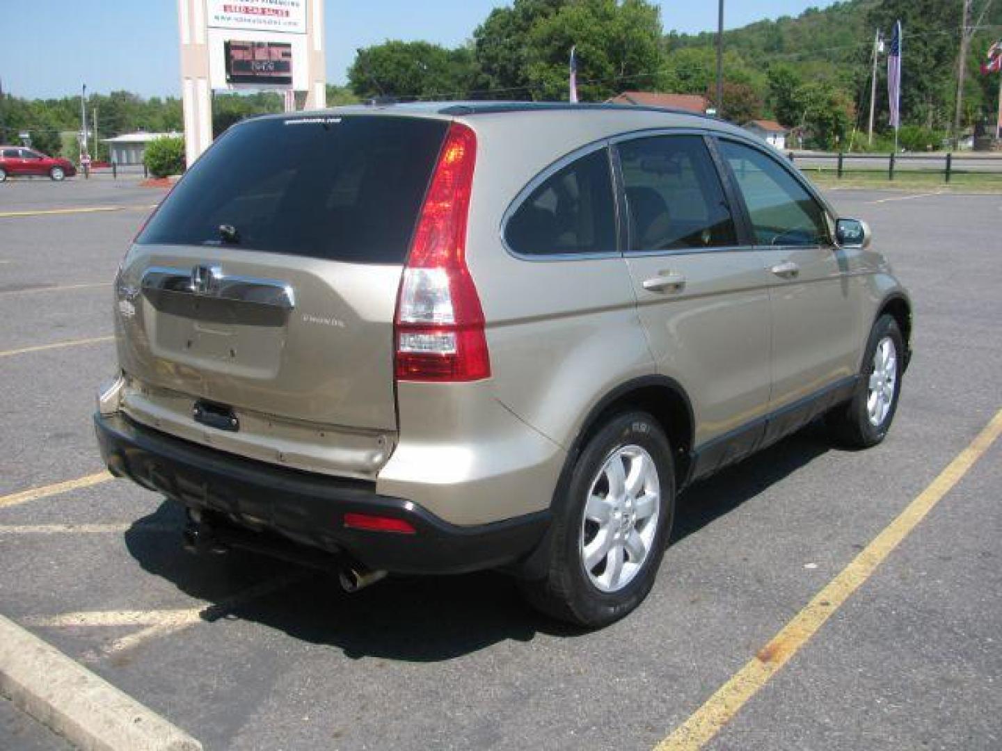 2009 Gold Honda CR-V EX-L 4WD 5-Speed AT (5J6RE48729L) with an 2.4L L4 DOHC 16V engine, 5-Speed Automatic transmission, located at 2443 Albert Pike, Hot Springs, AR, 71913, (501) 623-6255, 34.492222, -93.109993 - LISTED FEATURES MAY BE OPTIONAL AND NOT INCLUDED ON THIS VEHICLE!!! - Photo#2