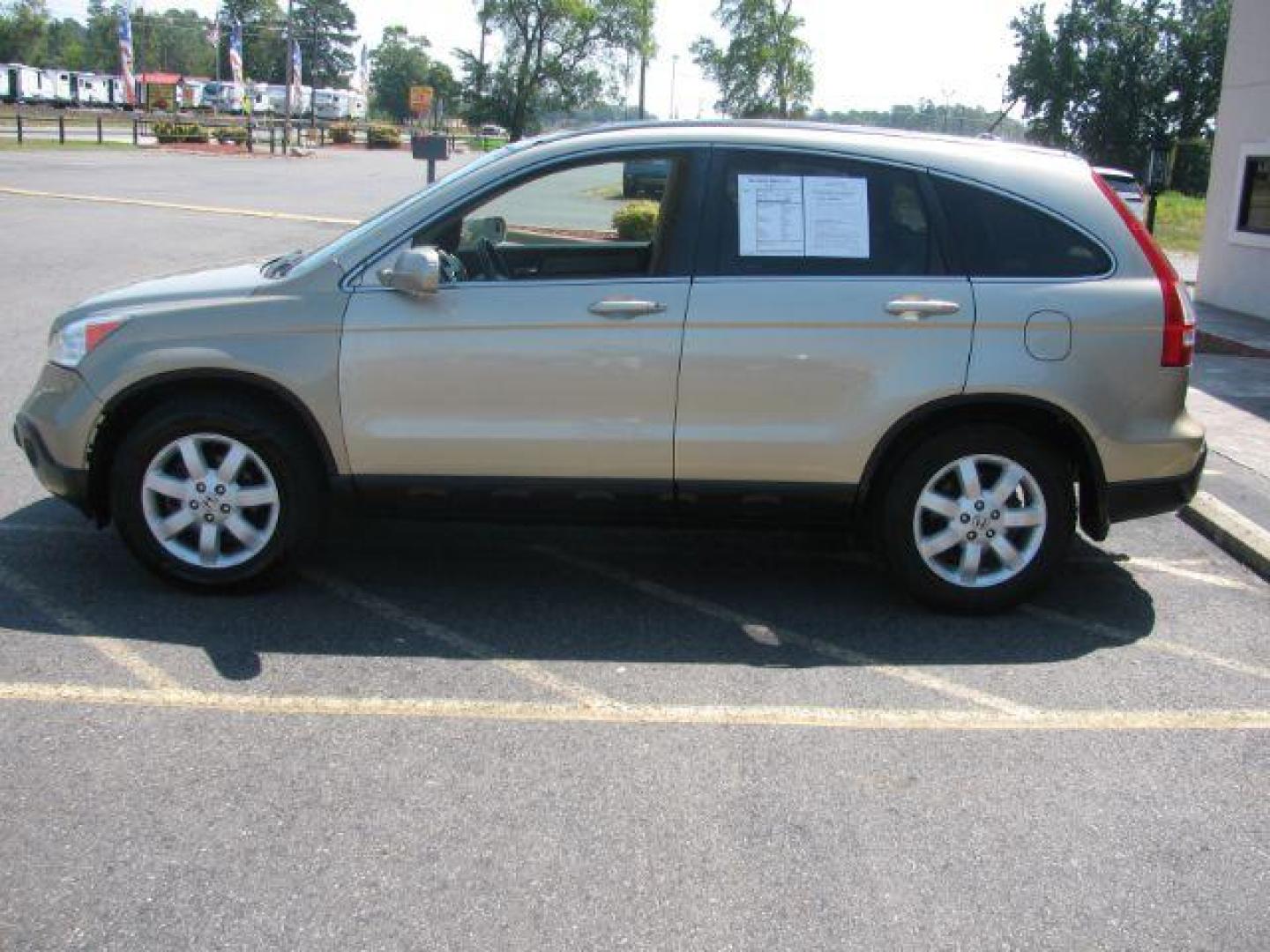 2009 Gold Honda CR-V EX-L 4WD 5-Speed AT (5J6RE48729L) with an 2.4L L4 DOHC 16V engine, 5-Speed Automatic transmission, located at 2443 Albert Pike, Hot Springs, AR, 71913, (501) 623-6255, 34.492222, -93.109993 - LISTED FEATURES MAY BE OPTIONAL AND NOT INCLUDED ON THIS VEHICLE!!! - Photo#4