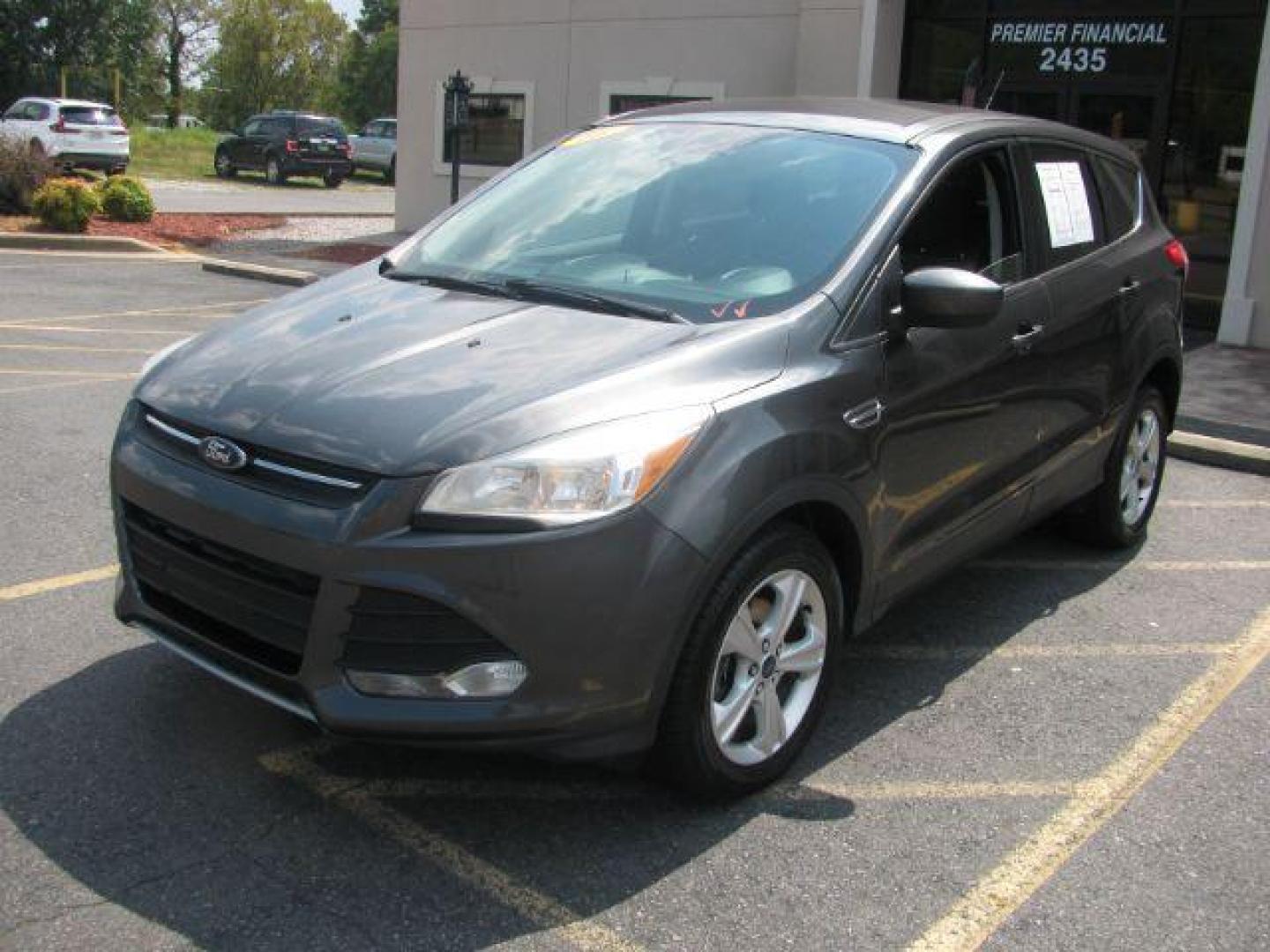 2016 Gray Ford Escape SE FWD (1FMCU0G75GU) with an 2.5L L4 DOHC 16V engine, 6-Speed Automatic transmission, located at 2443 Albert Pike, Hot Springs, AR, 71913, (501) 623-6255, 34.492222, -93.109993 - Photo#0