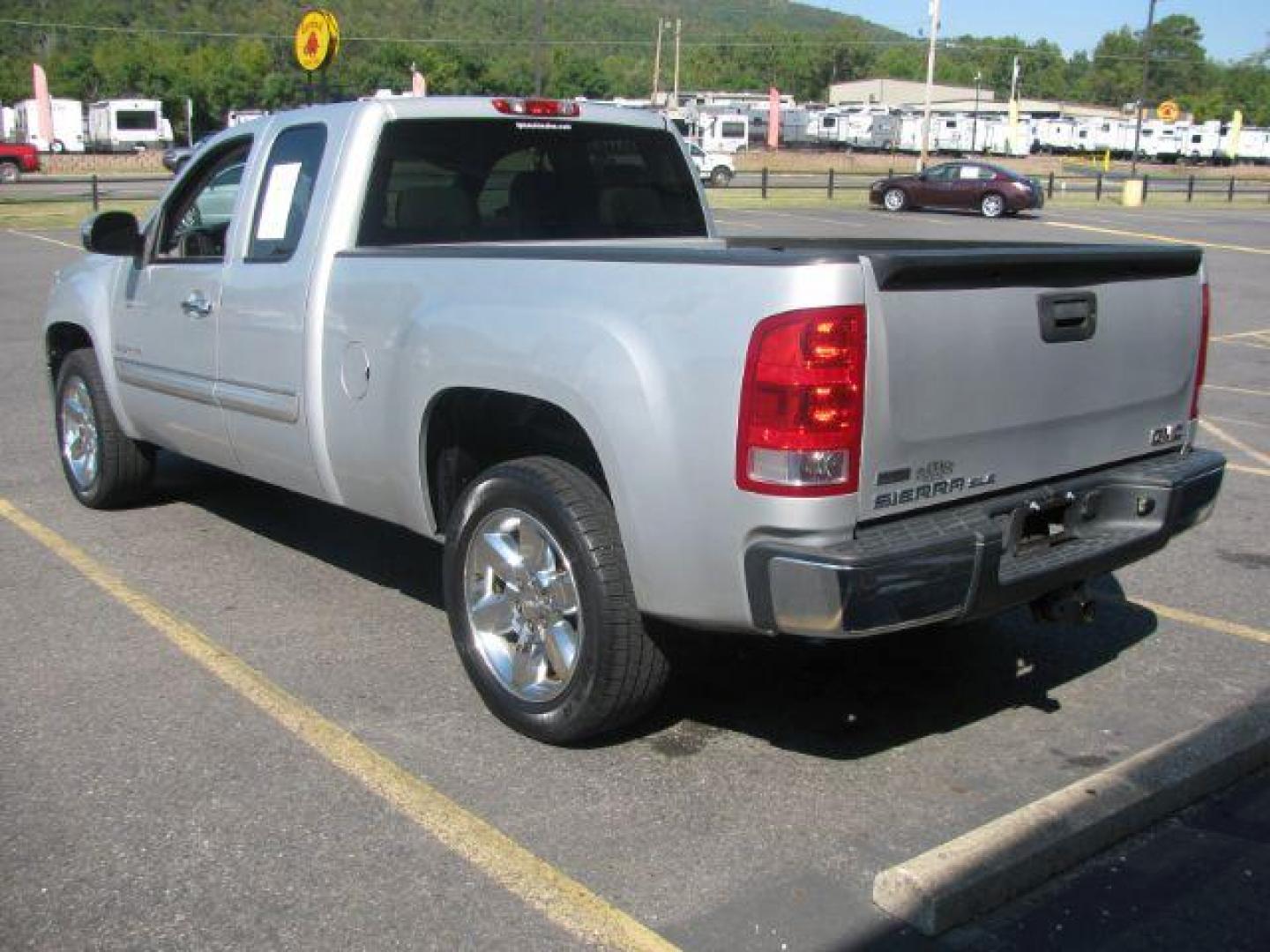 2012 Silver GMC Sierra 1500 SLE Ext. Cab 2WD (1GTR1VE09CZ) with an 5.3L V8 OHV 16V FFV engine, 6-Speed Automatic transmission, located at 2443 Albert Pike, Hot Springs, AR, 71913, (501) 623-6255, 34.492222, -93.109993 - Photo#2