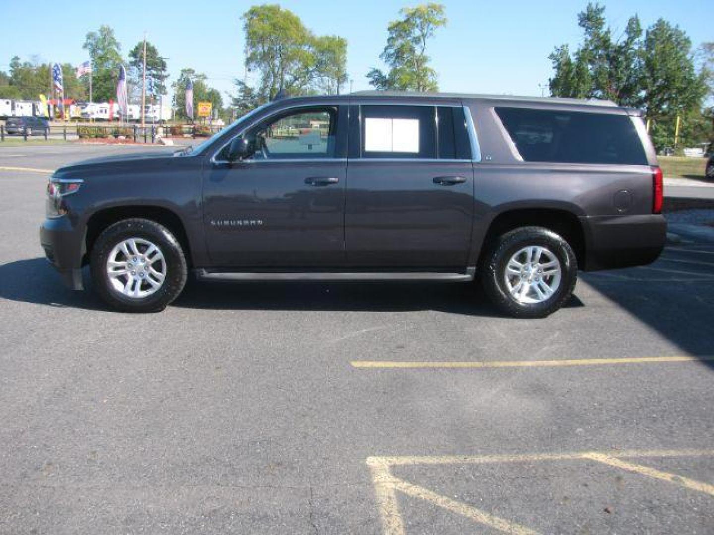 2015 Black Chevrolet Suburban LT 1500 2WD (1GNSCJKC1FR) with an 5.3L V8 OHV 16V engine, 6-Speed Automatic transmission, located at 2443 Albert Pike, Hot Springs, AR, 71913, (501) 623-6255, 34.492222, -93.109993 - Photo#1