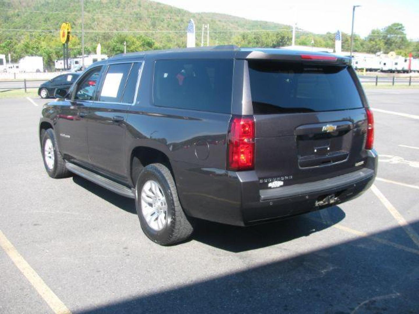 2015 Black Chevrolet Suburban LT 1500 2WD (1GNSCJKC1FR) with an 5.3L V8 OHV 16V engine, 6-Speed Automatic transmission, located at 2443 Albert Pike, Hot Springs, AR, 71913, (501) 623-6255, 34.492222, -93.109993 - Photo#2