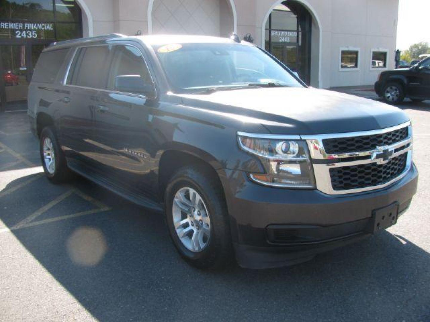 2015 Black Chevrolet Suburban LT 1500 2WD (1GNSCJKC1FR) with an 5.3L V8 OHV 16V engine, 6-Speed Automatic transmission, located at 2443 Albert Pike, Hot Springs, AR, 71913, (501) 623-6255, 34.492222, -93.109993 - Photo#5