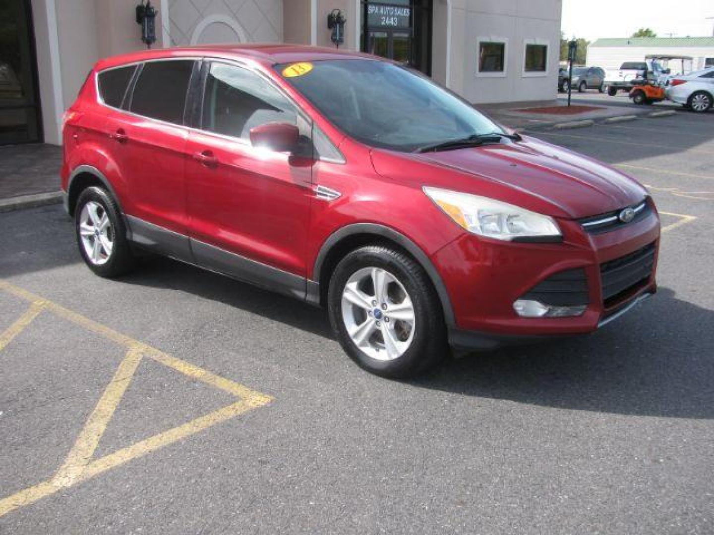 2013 Maroon Ford Escape SE FWD (1FMCU0G9XDU) with an 2.0L L4 DOHC 16V engine, 6-Speed Automatic transmission, located at 2443 Albert Pike, Hot Springs, AR, 71913, (501) 623-6255, 34.492222, -93.109993 - Photo#0