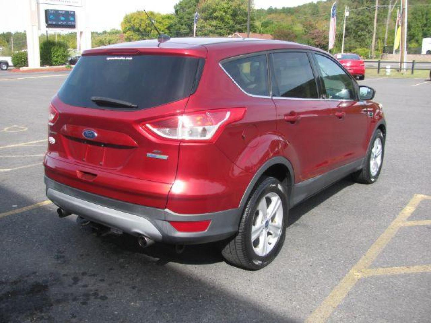 2013 Maroon Ford Escape SE FWD (1FMCU0G9XDU) with an 2.0L L4 DOHC 16V engine, 6-Speed Automatic transmission, located at 2443 Albert Pike, Hot Springs, AR, 71913, (501) 623-6255, 34.492222, -93.109993 - Photo#2