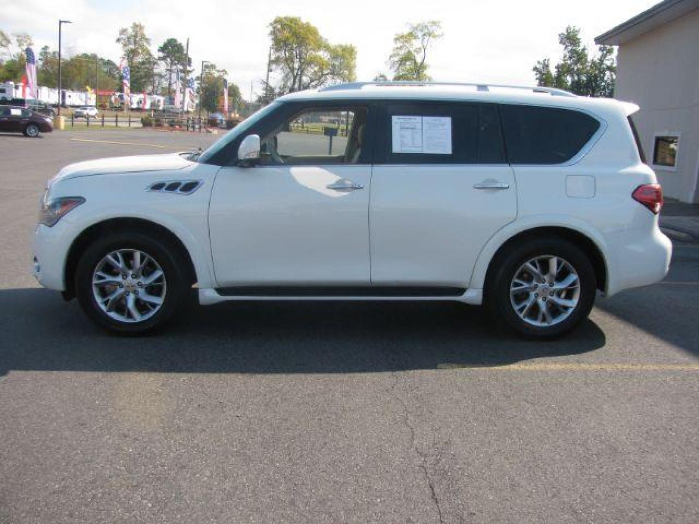 2013 White Infiniti QX56 4WD (JN8AZ2NE5D9) with an 5.6L V8 DOHC 32V engine, 5-Speed Automatic transmission, located at 2443 Albert Pike, Hot Springs, AR, 71913, (501) 623-6255, 34.492222, -93.109993 - Photo#1