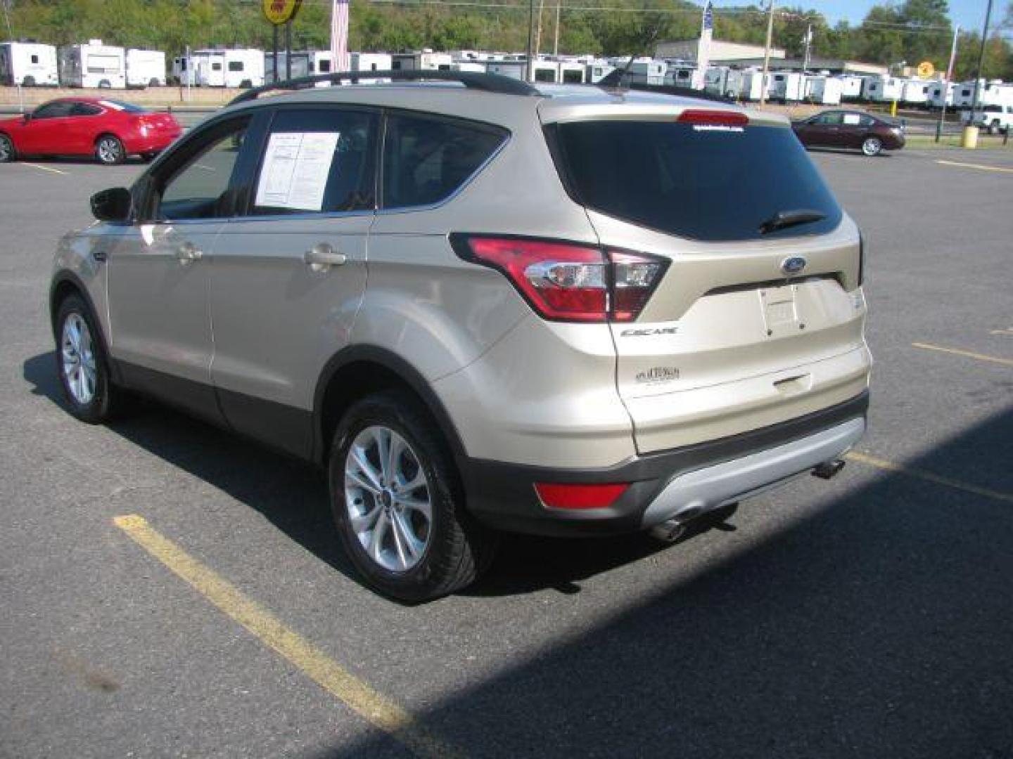 2018 Tan Ford Escape SE FWD (1FMCU0GD2JU) with an 1.5L L4 DOHC 16V engine, 6-Speed Automatic transmission, located at 2443 Albert Pike, Hot Springs, AR, 71913, (501) 623-6255, 34.492222, -93.109993 - Photo#2