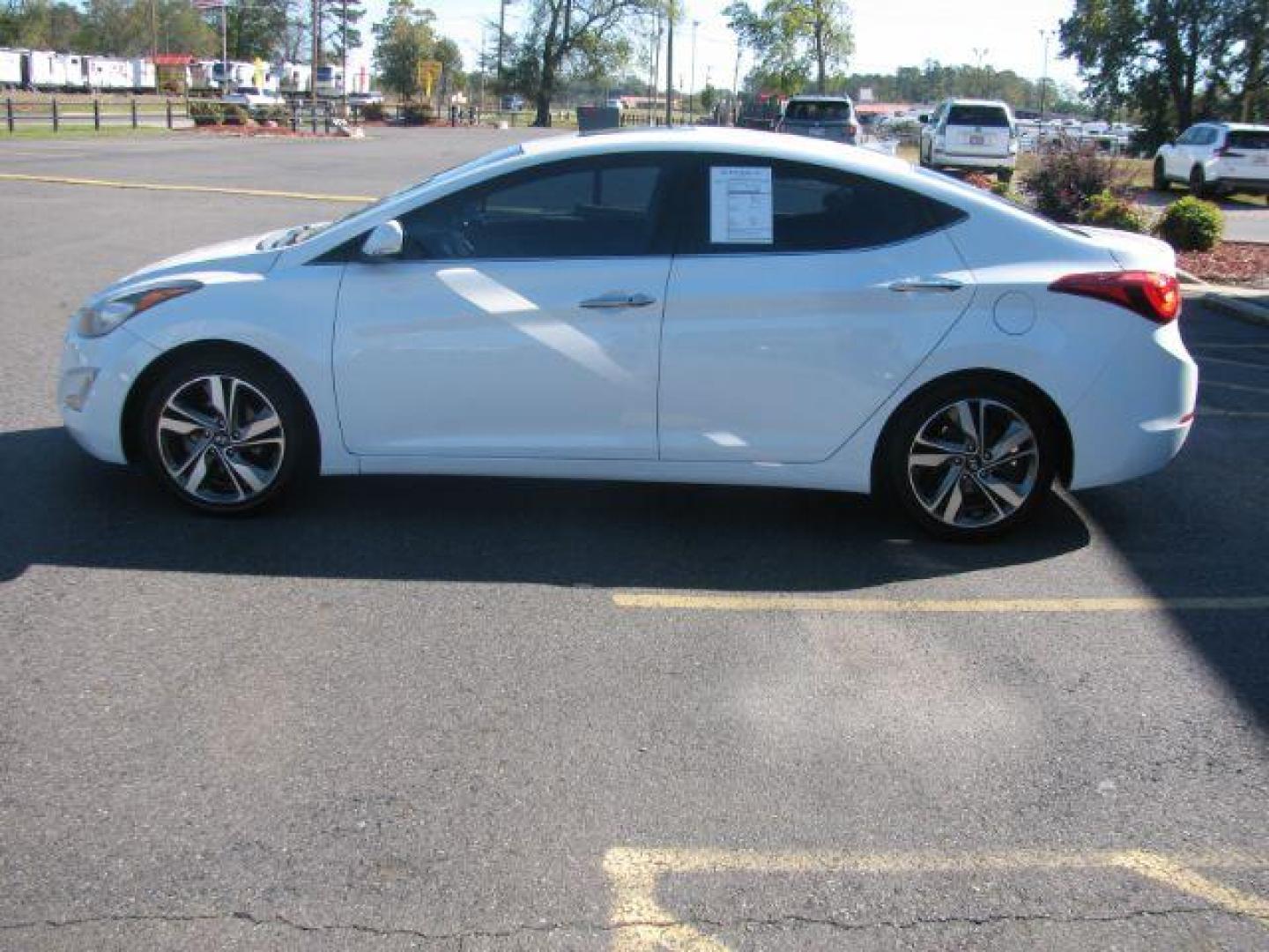 2014 White Hyundai Elantra Limited (5NPDH4AE2EH) with an 1.8L L4 DOHC 16V engine, 6-Speed Automatic transmission, located at 2443 Albert Pike, Hot Springs, AR, 71913, (501) 623-6255, 34.492222, -93.109993 - Photo#4