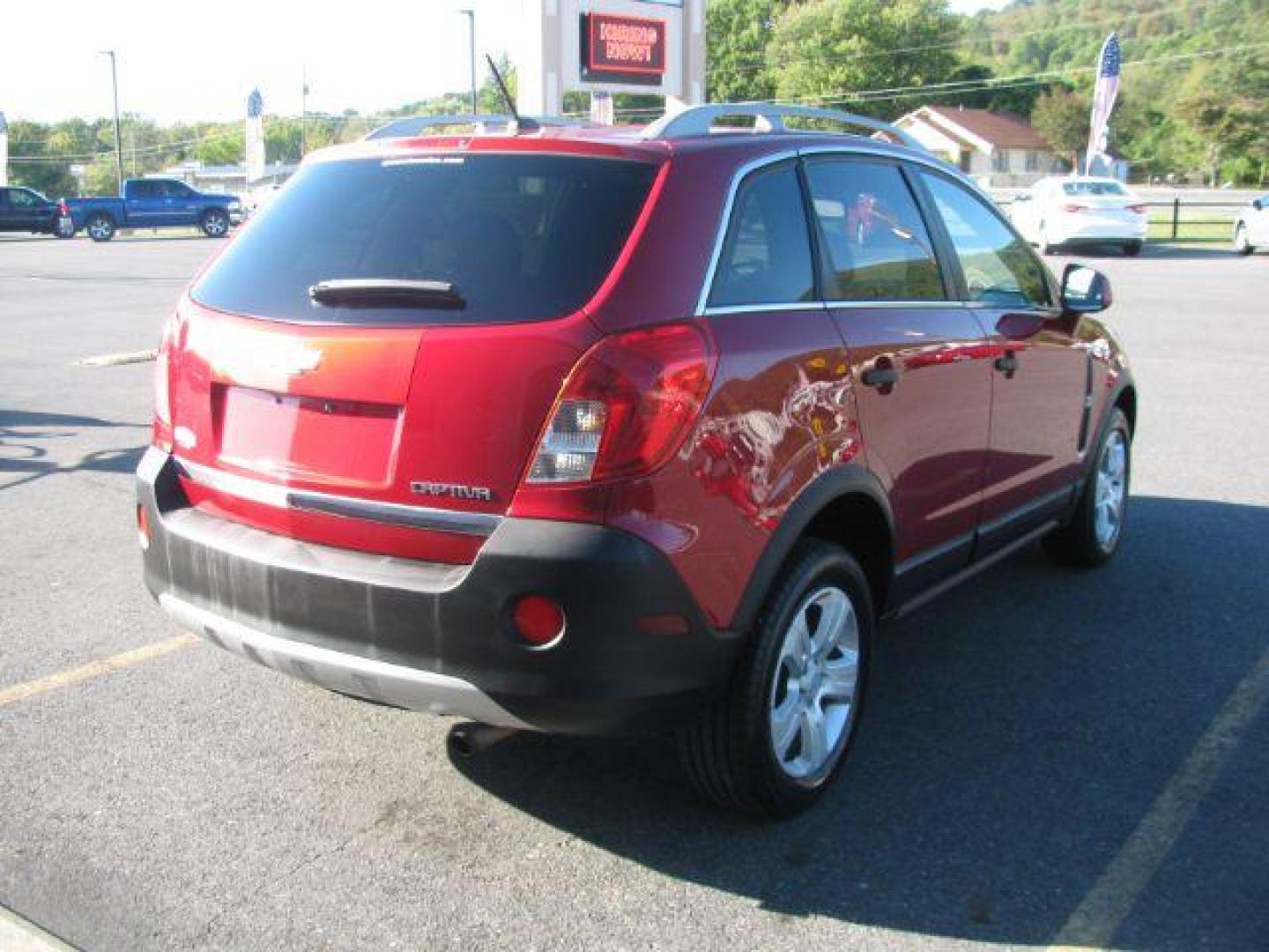 2014 Maroon Chevrolet Captiva Sport 2LS FWD (3GNAL2EK9ES) with an 2.4L L4 DOHC 16V FFV engine, 6-Speed Automatic transmission, located at 2443 Albert Pike, Hot Springs, AR, 71913, (501) 623-6255, 34.492222, -93.109993 - Photo#3