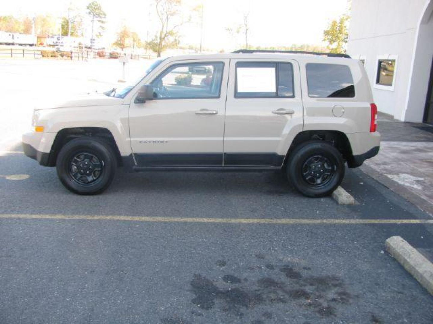 2017 Tan Jeep Patriot Sport 4WD (1C4NJRBB4HD) with an 2.4L L4 DOHC 16V engine, located at 2443 Albert Pike, Hot Springs, AR, 71913, (501) 623-6255, 34.492222, -93.109993 - LISTED FEATURES MAY BE OPTIONAL AND NOT INCLUDED ON THIS VEHICLE!!! - Photo#1