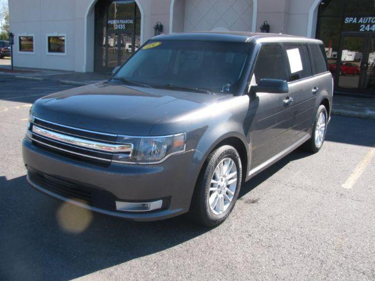 2015 Gray Ford Flex SEL AWD (2FMHK6C84FB) with an 3.5L V6 DOHC 24V engine, 6-Speed Automatic Overdrive transmission, located at 2443 Albert Pike, Hot Springs, AR, 71913, (501) 623-6255, 34.492222, -93.109993 - Photo#0