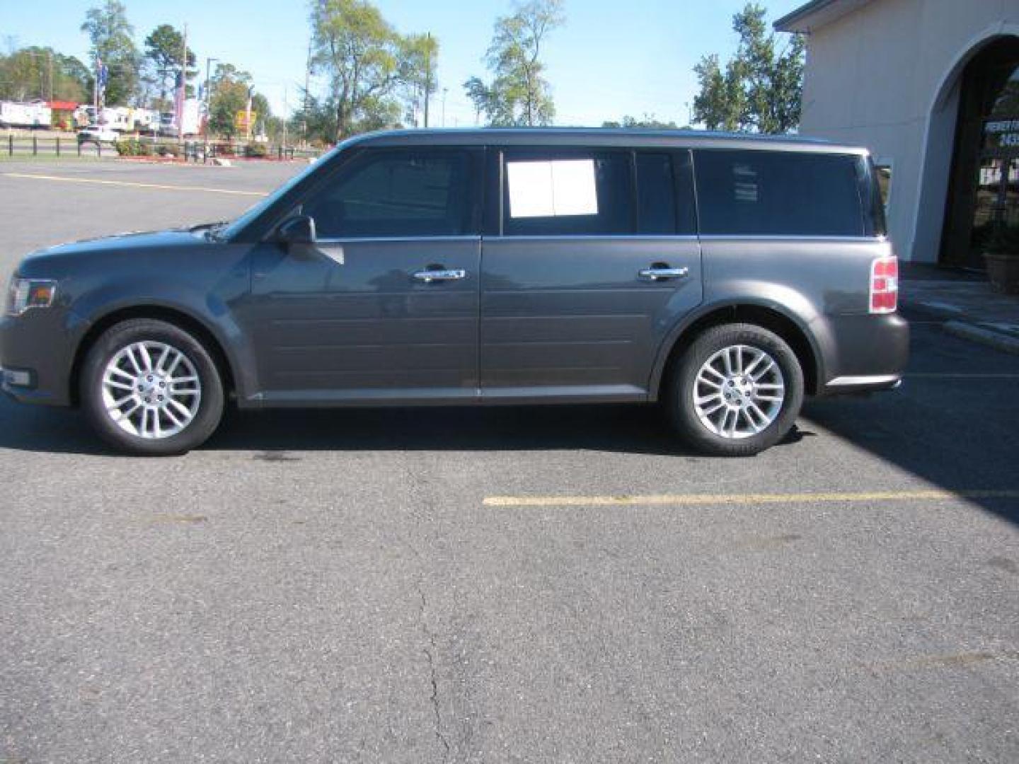 2015 Gray Ford Flex SEL AWD (2FMHK6C84FB) with an 3.5L V6 DOHC 24V engine, 6-Speed Automatic Overdrive transmission, located at 2443 Albert Pike, Hot Springs, AR, 71913, (501) 623-6255, 34.492222, -93.109993 - Photo#1