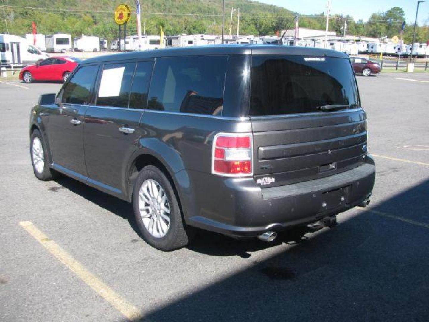 2015 Gray Ford Flex SEL AWD (2FMHK6C84FB) with an 3.5L V6 DOHC 24V engine, 6-Speed Automatic Overdrive transmission, located at 2443 Albert Pike, Hot Springs, AR, 71913, (501) 623-6255, 34.492222, -93.109993 - Photo#2