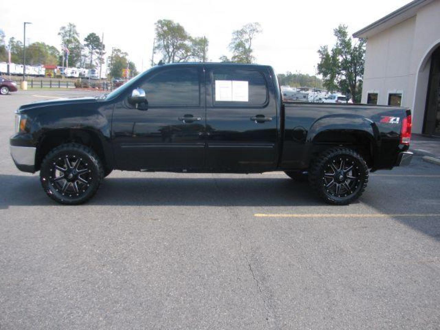 2012 Black GMC Sierra 1500 SLE Crew Cab 4WD (3GTP2VE78CG) with an 5.3L V8 OHV 16V FFV engine, 6-Speed Automatic transmission, located at 2443 Albert Pike, Hot Springs, AR, 71913, (501) 623-6255, 34.492222, -93.109993 - Photo#1