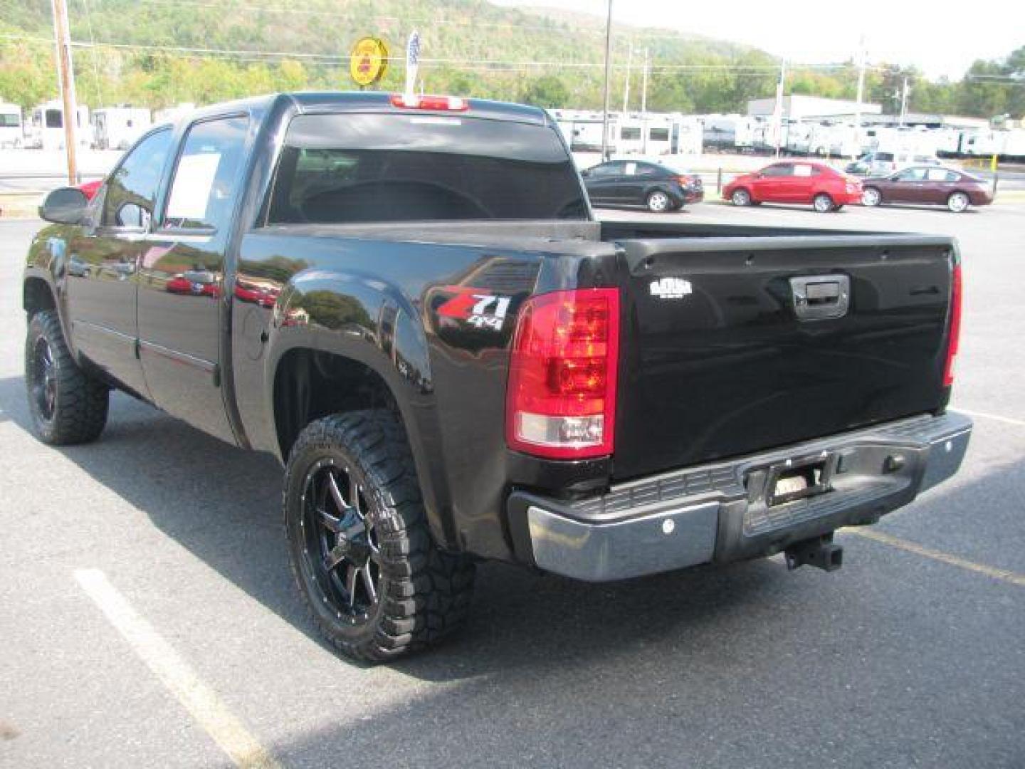 2012 Black GMC Sierra 1500 SLE Crew Cab 4WD (3GTP2VE78CG) with an 5.3L V8 OHV 16V FFV engine, 6-Speed Automatic transmission, located at 2443 Albert Pike, Hot Springs, AR, 71913, (501) 623-6255, 34.492222, -93.109993 - Photo#2